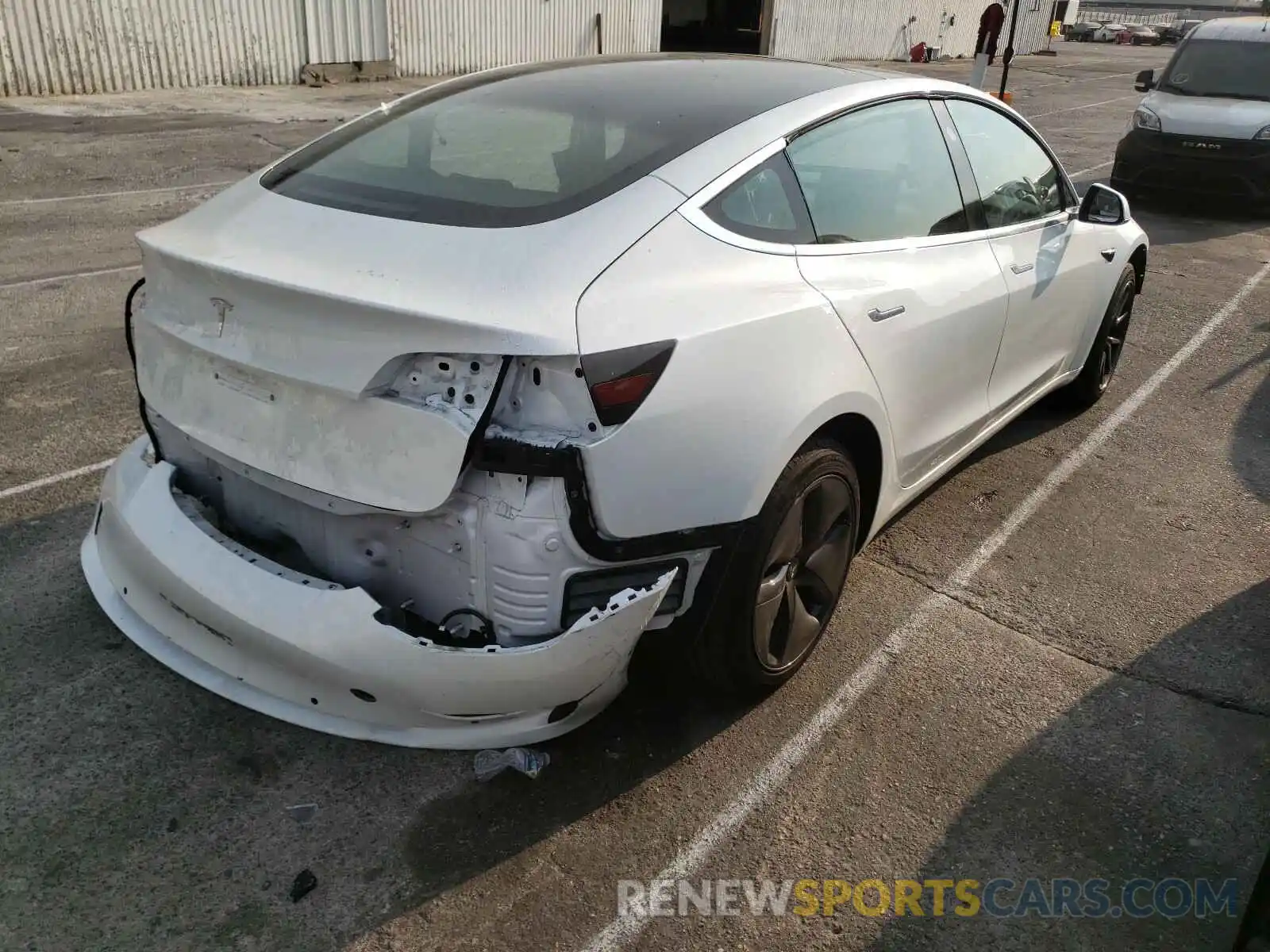 4 Photograph of a damaged car 5YJ3E1EA1LF659636 TESLA MODEL 3 2020