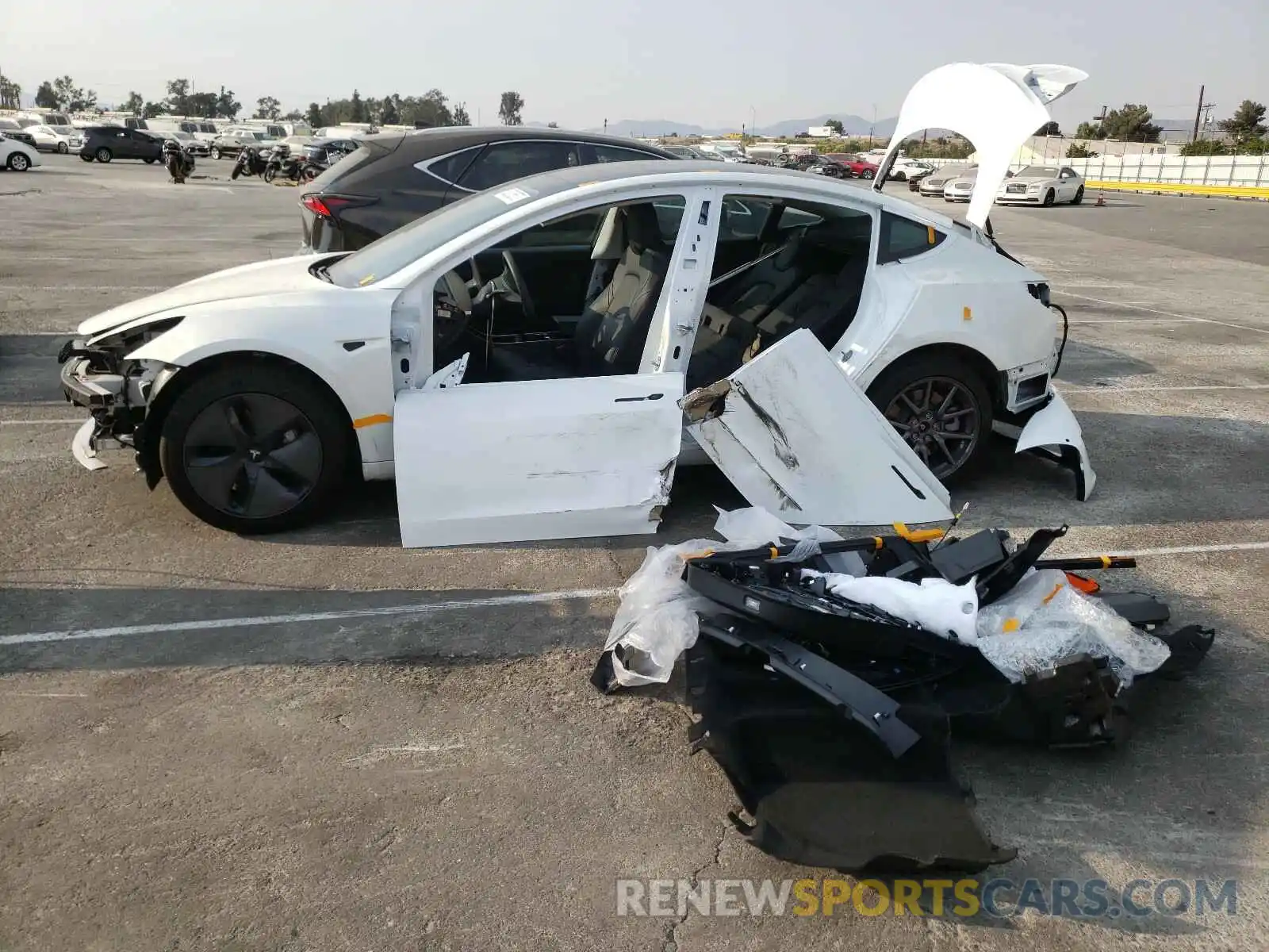 9 Photograph of a damaged car 5YJ3E1EA1LF659636 TESLA MODEL 3 2020