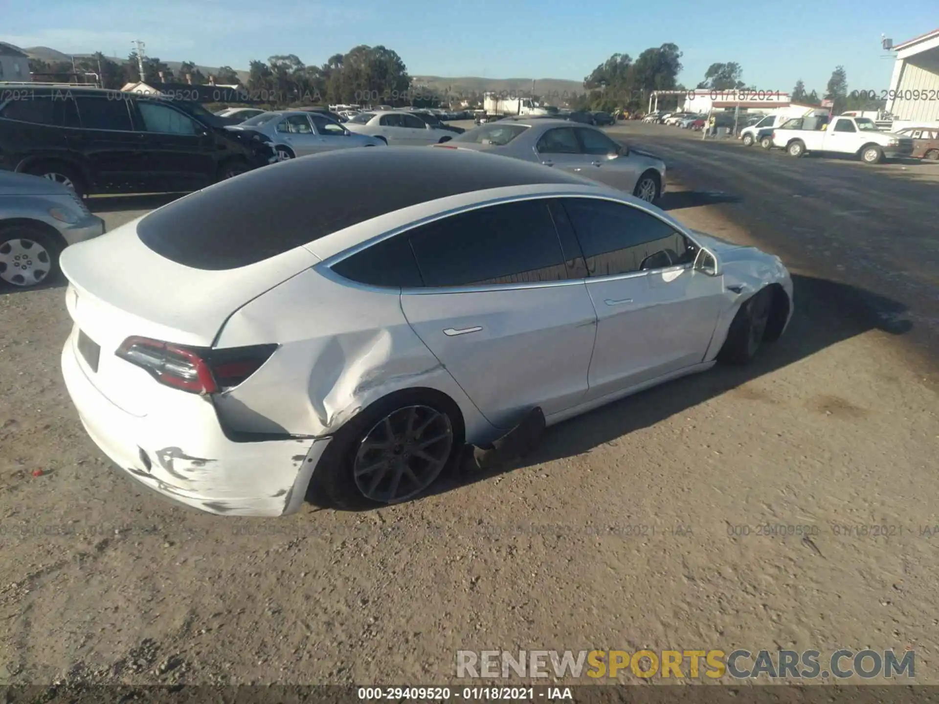 4 Photograph of a damaged car 5YJ3E1EA1LF660074 TESLA MODEL 3 2020