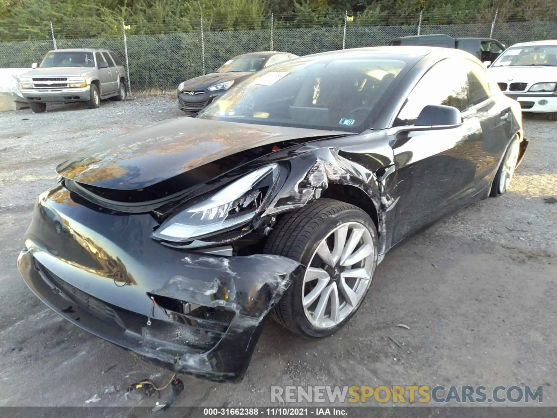 6 Photograph of a damaged car 5YJ3E1EA1LF660897 TESLA MODEL 3 2020