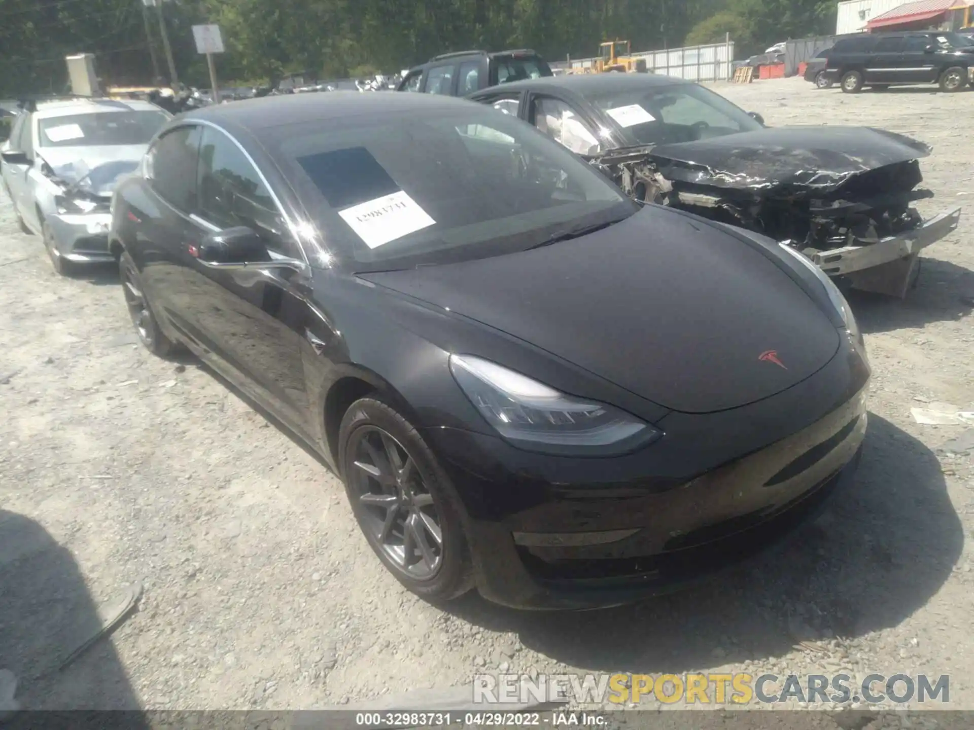 1 Photograph of a damaged car 5YJ3E1EA1LF704395 TESLA MODEL 3 2020