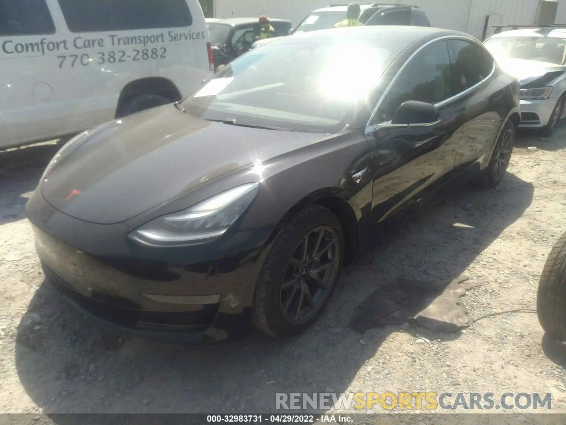 2 Photograph of a damaged car 5YJ3E1EA1LF704395 TESLA MODEL 3 2020