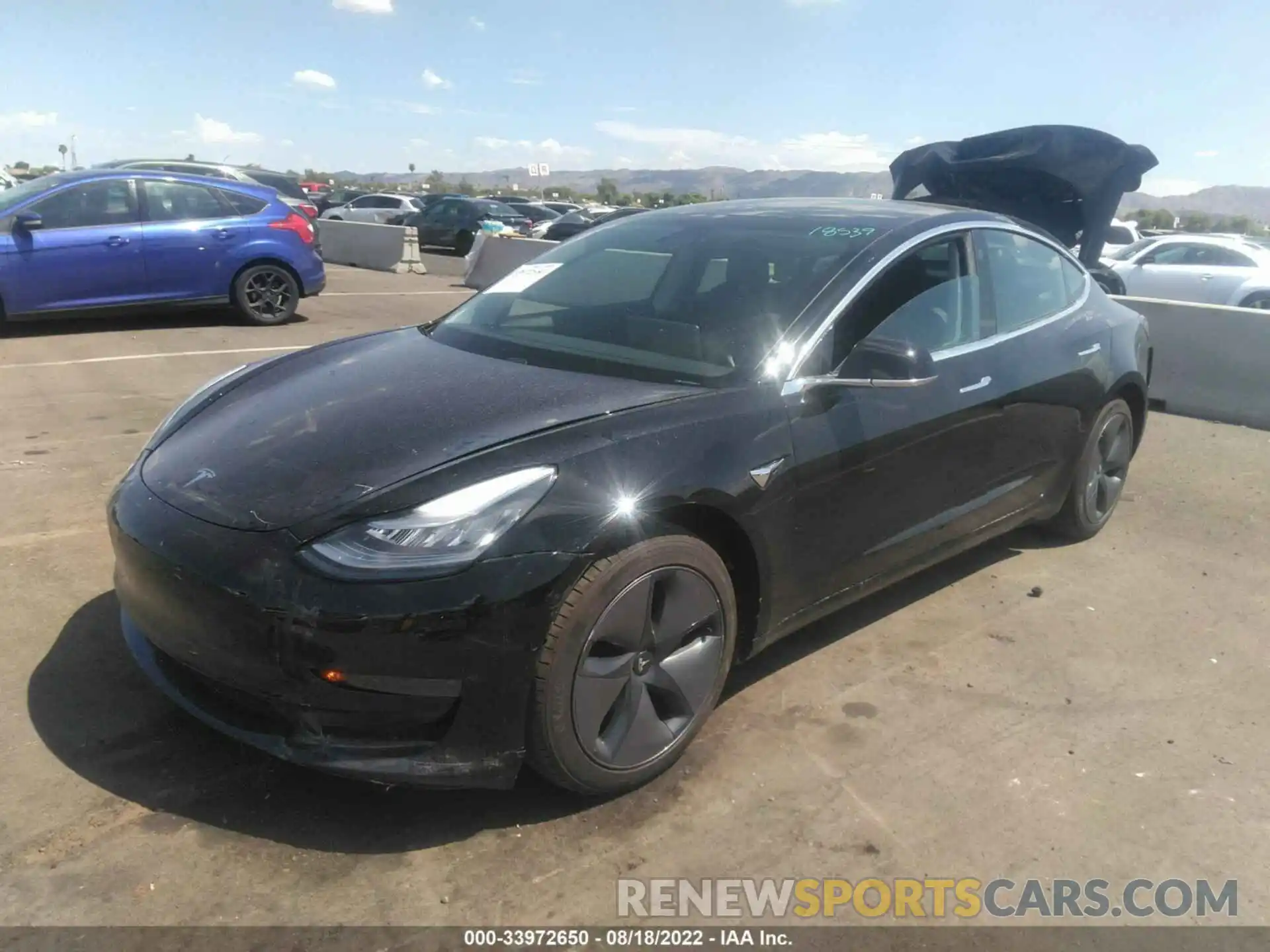 2 Photograph of a damaged car 5YJ3E1EA1LF704431 TESLA MODEL 3 2020