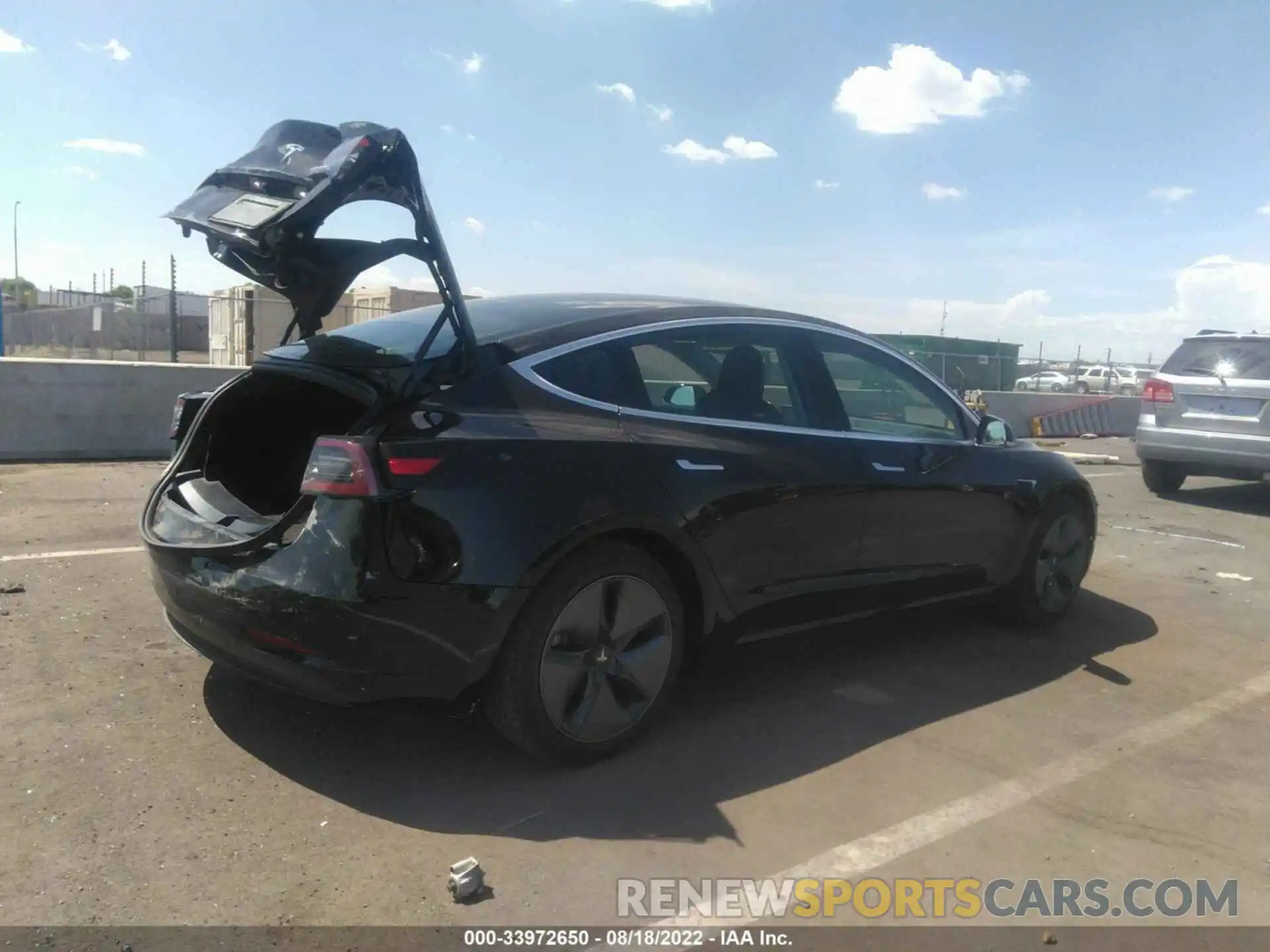 4 Photograph of a damaged car 5YJ3E1EA1LF704431 TESLA MODEL 3 2020