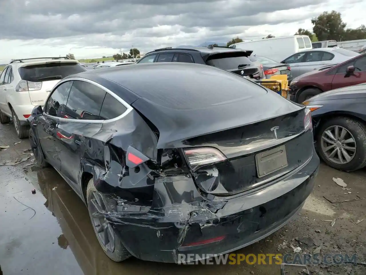 2 Photograph of a damaged car 5YJ3E1EA1LF704574 TESLA MODEL 3 2020