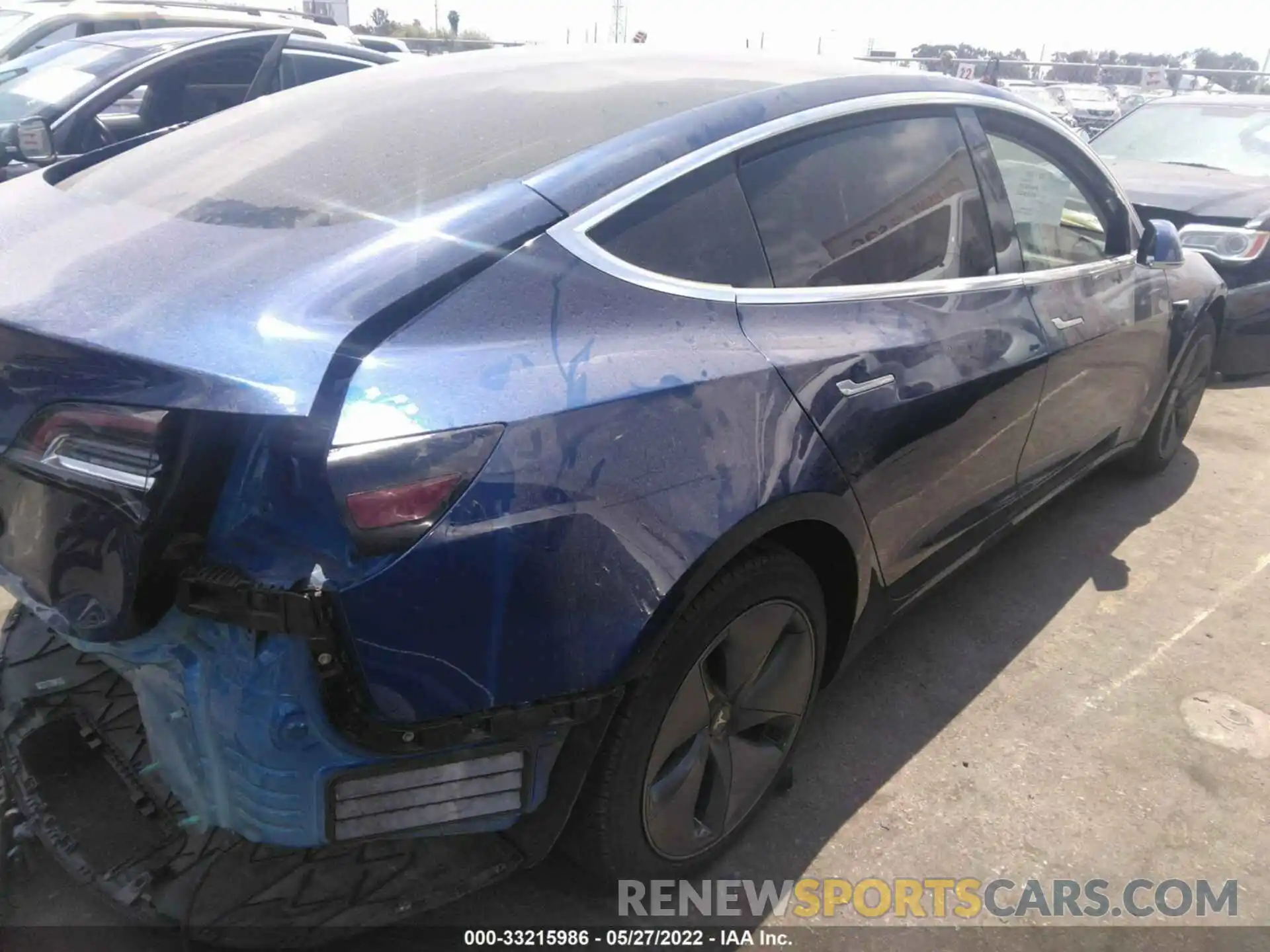 4 Photograph of a damaged car 5YJ3E1EA1LF706048 TESLA MODEL 3 2020