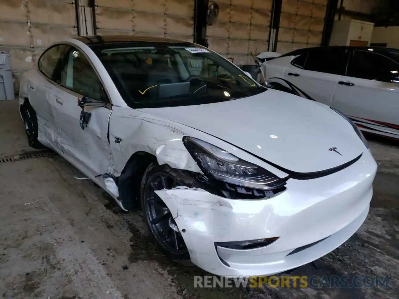 1 Photograph of a damaged car 5YJ3E1EA1LF740118 TESLA MODEL 3 2020