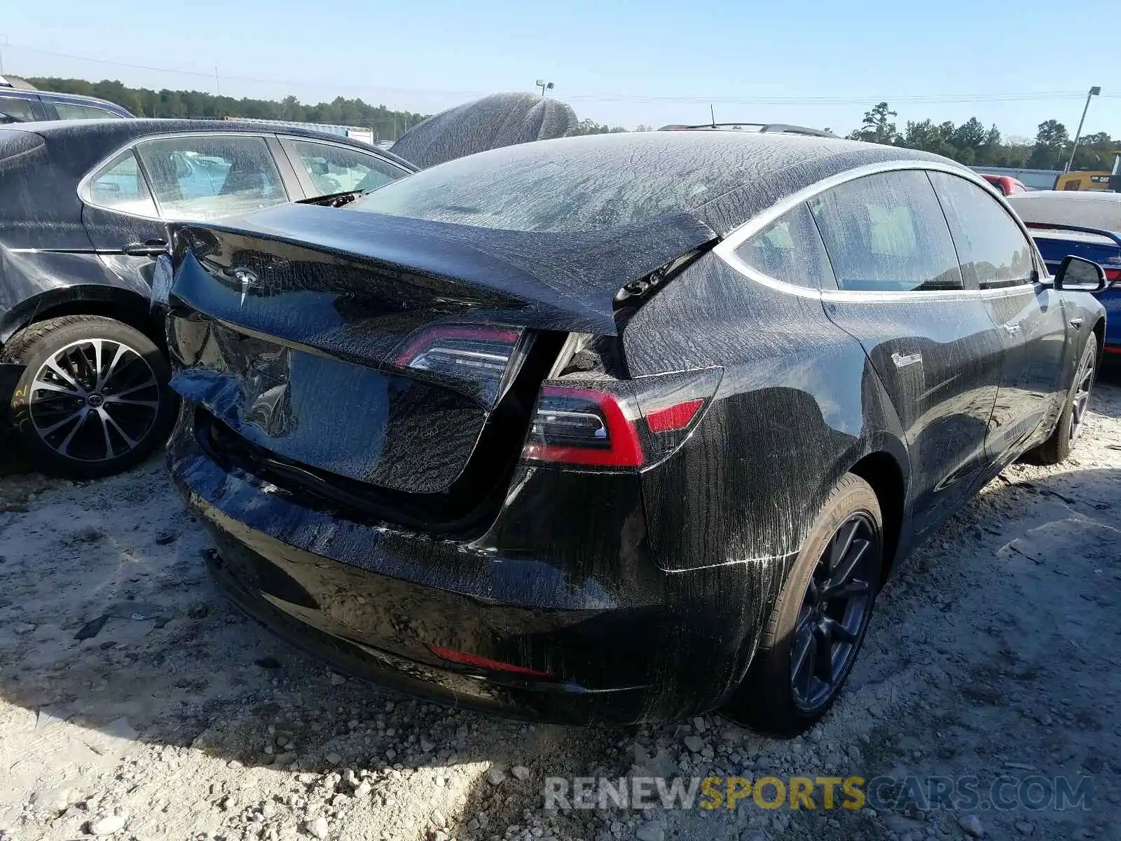 4 Photograph of a damaged car 5YJ3E1EA1LF740863 TESLA MODEL 3 2020