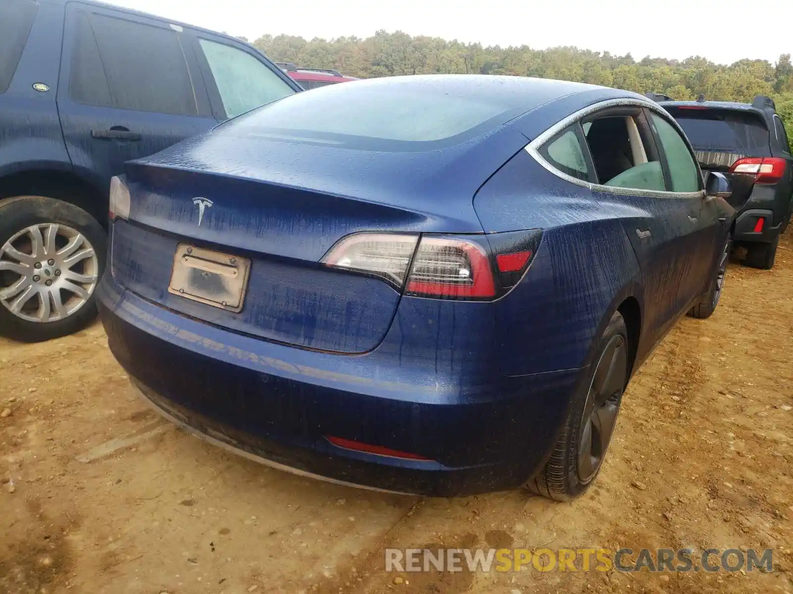 4 Photograph of a damaged car 5YJ3E1EA1LF745691 TESLA MODEL 3 2020