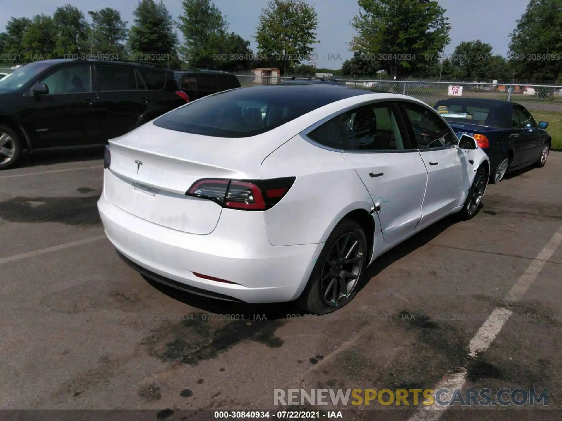 4 Photograph of a damaged car 5YJ3E1EA1LF747179 TESLA MODEL 3 2020