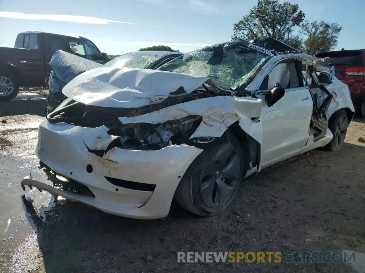 2 Photograph of a damaged car 5YJ3E1EA1LF785088 TESLA MODEL 3 2020