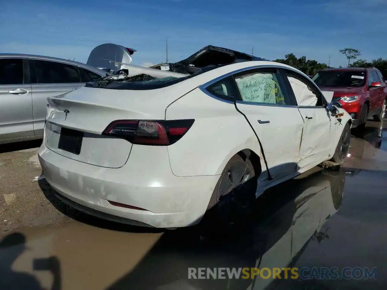 4 Photograph of a damaged car 5YJ3E1EA1LF785088 TESLA MODEL 3 2020