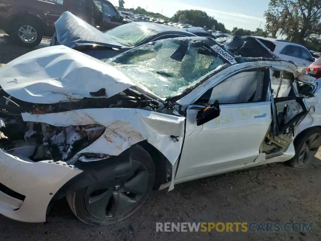 9 Photograph of a damaged car 5YJ3E1EA1LF785088 TESLA MODEL 3 2020