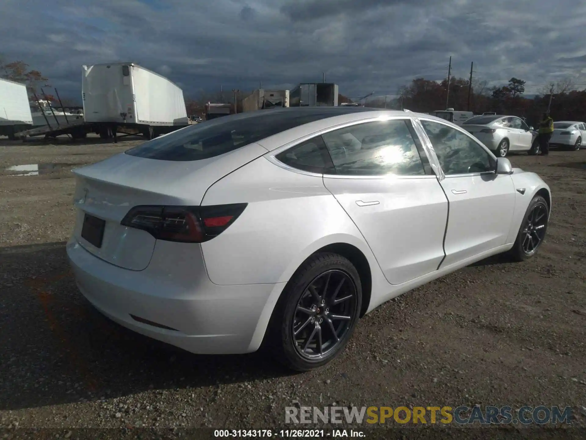 4 Photograph of a damaged car 5YJ3E1EA1LF792655 TESLA MODEL 3 2020