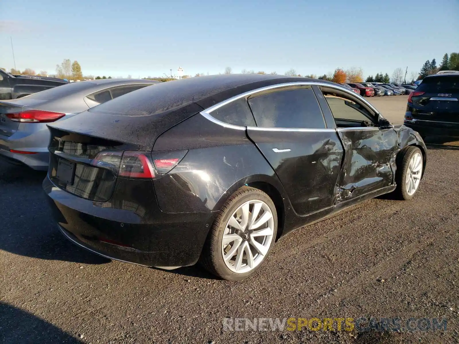 4 Photograph of a damaged car 5YJ3E1EA1LF794440 TESLA MODEL 3 2020