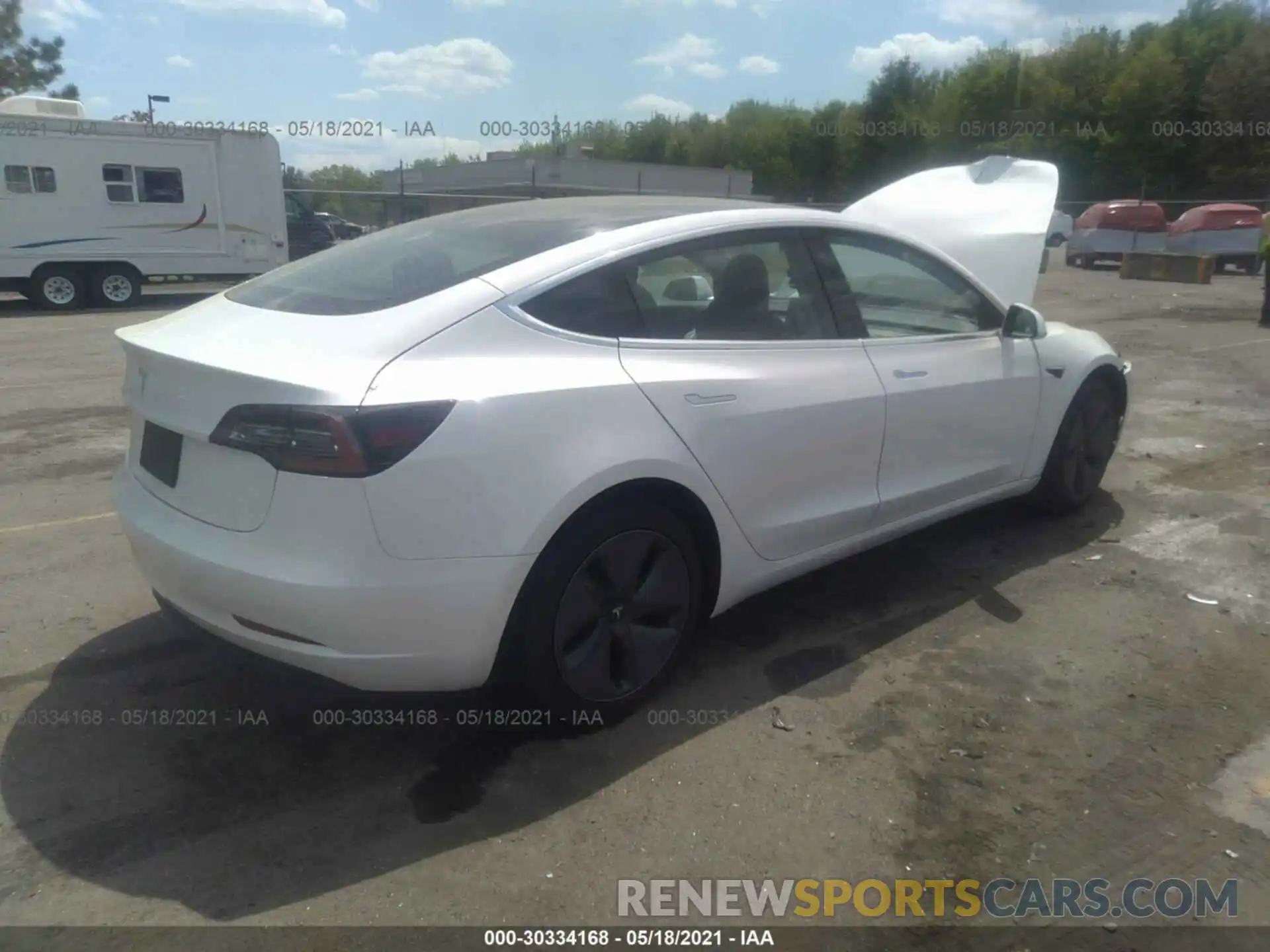 4 Photograph of a damaged car 5YJ3E1EA1LF797354 TESLA MODEL 3 2020