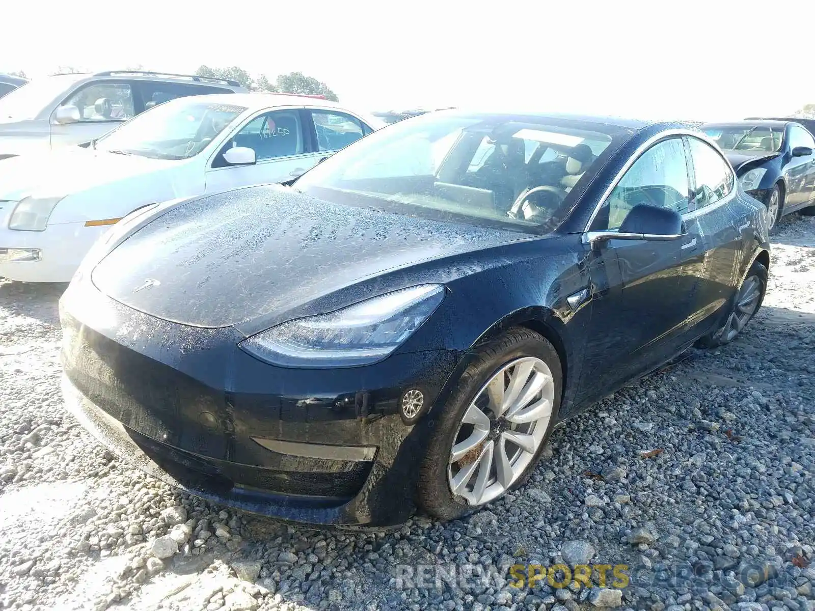 2 Photograph of a damaged car 5YJ3E1EA1LF797418 TESLA MODEL 3 2020