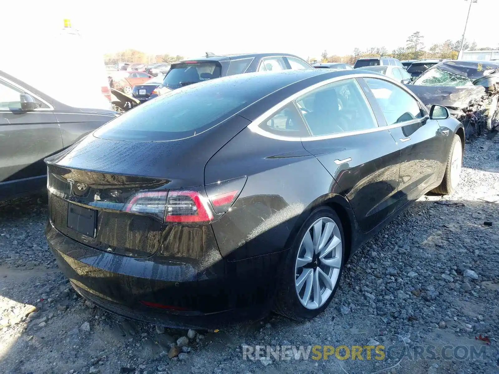 4 Photograph of a damaged car 5YJ3E1EA1LF797418 TESLA MODEL 3 2020