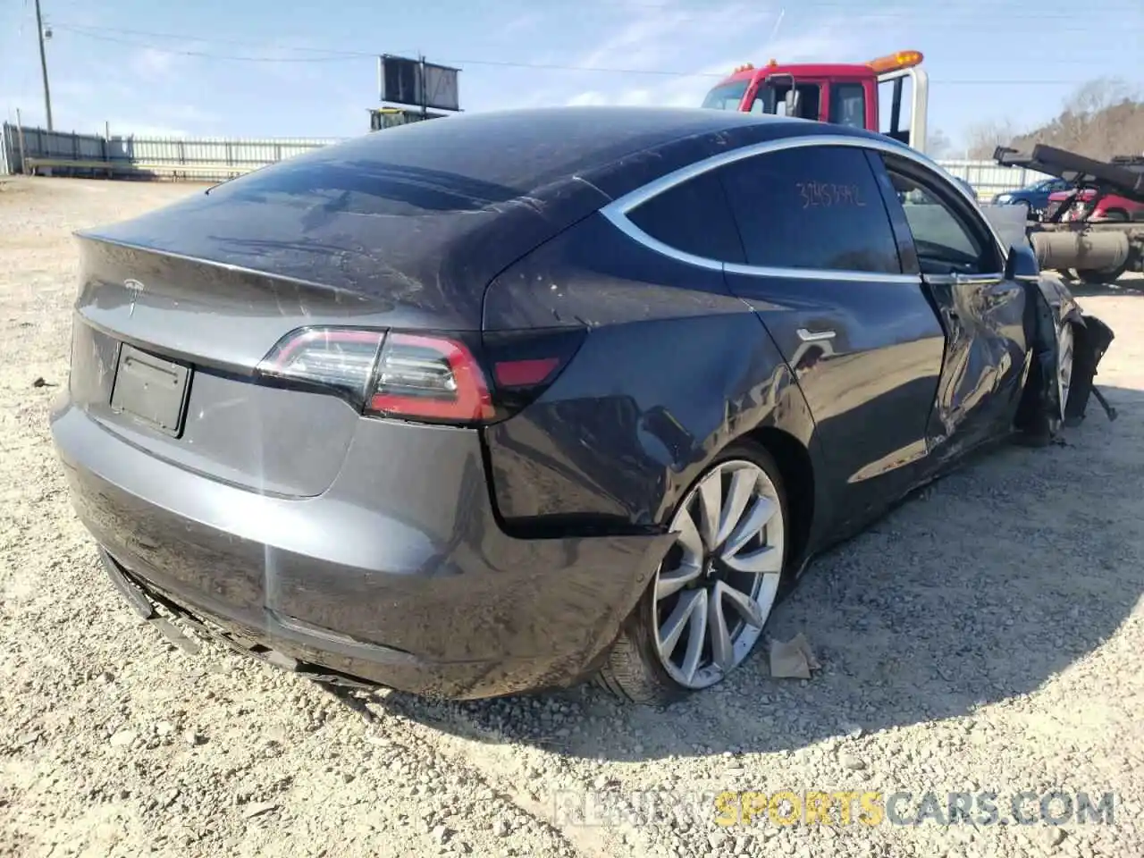 4 Photograph of a damaged car 5YJ3E1EA1LF797922 TESLA MODEL 3 2020