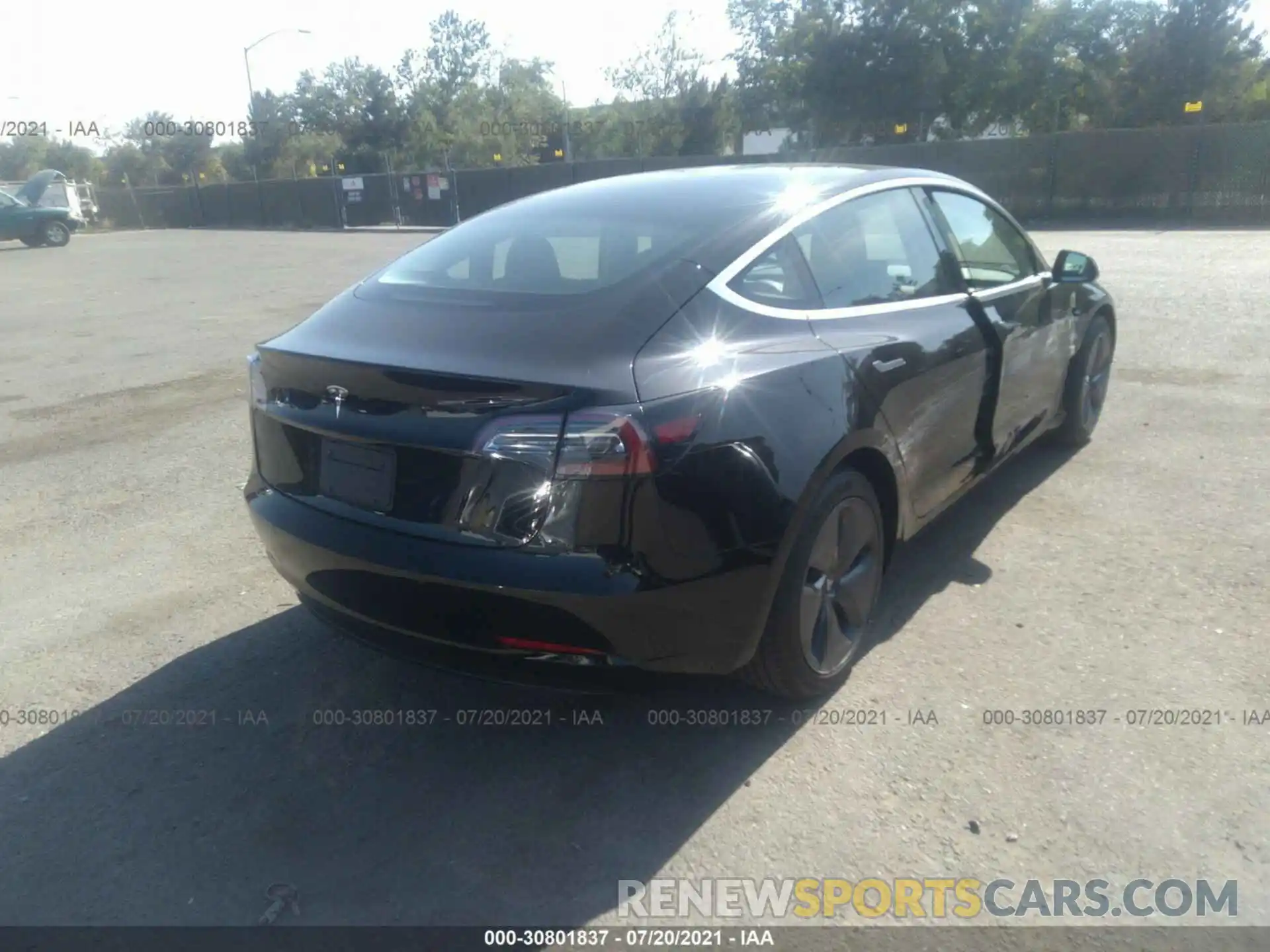 4 Photograph of a damaged car 5YJ3E1EA1LF803329 TESLA MODEL 3 2020