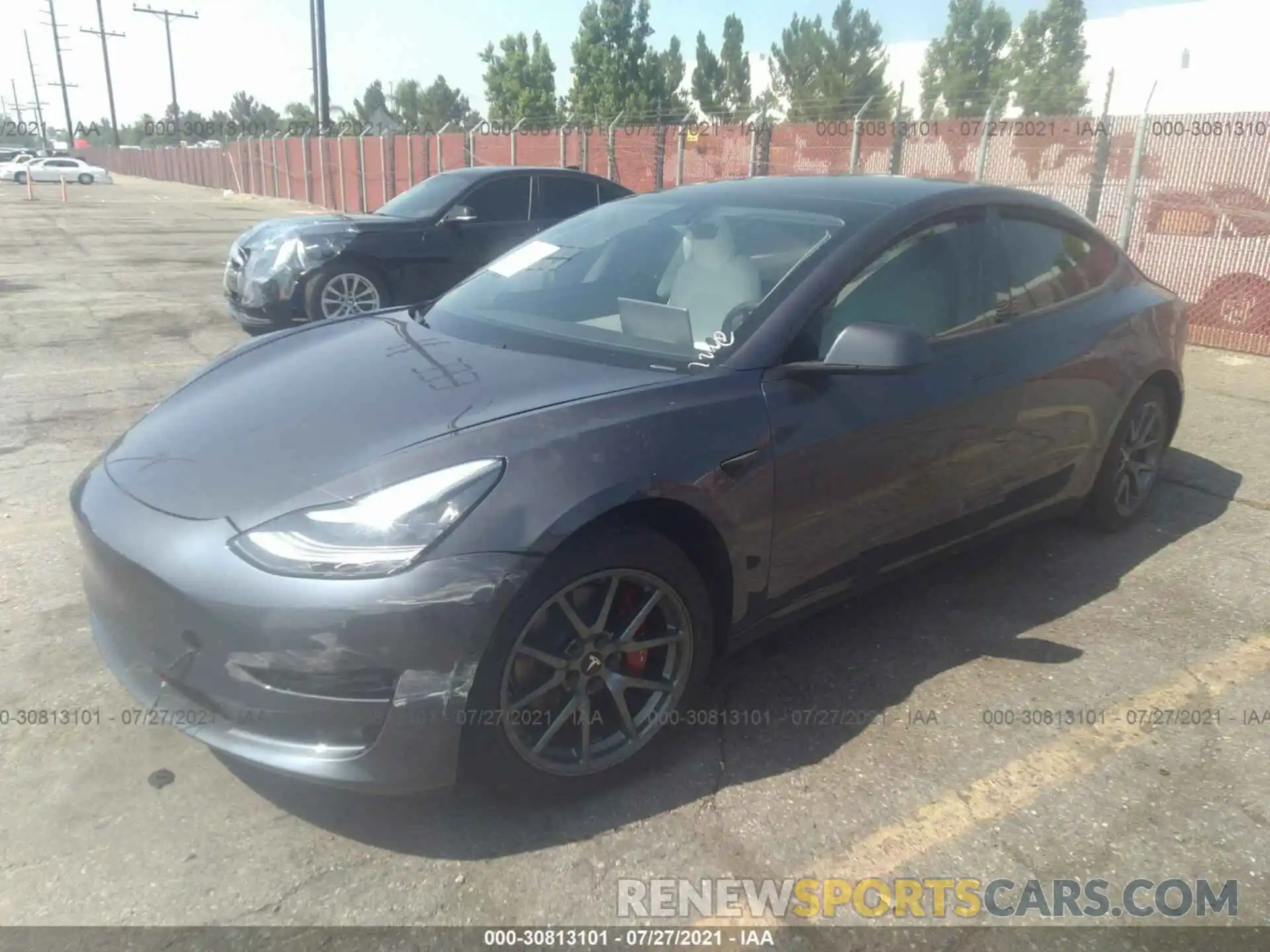 2 Photograph of a damaged car 5YJ3E1EA1LF804836 TESLA MODEL 3 2020