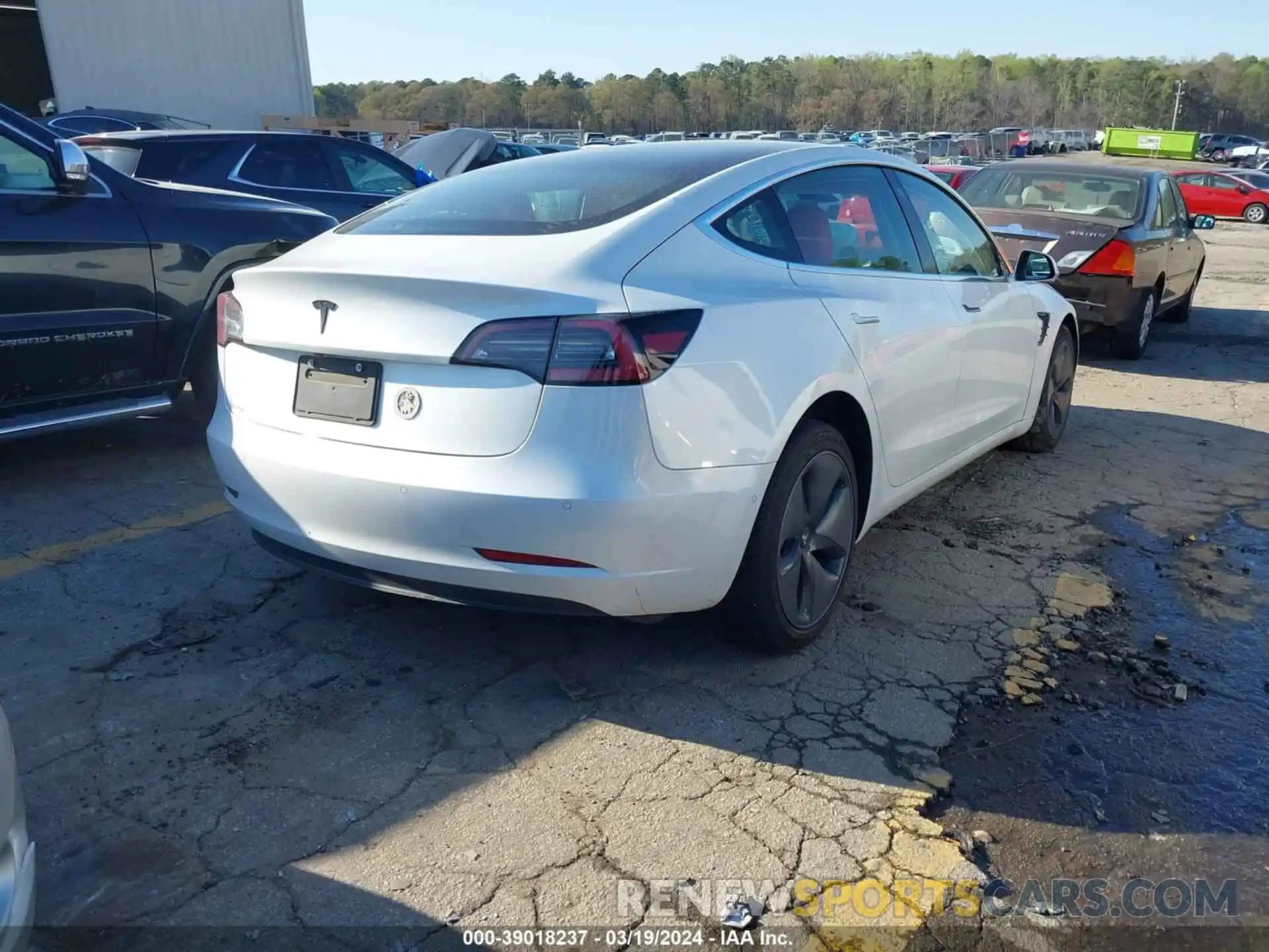 4 Photograph of a damaged car 5YJ3E1EA2LF504268 TESLA MODEL 3 2020