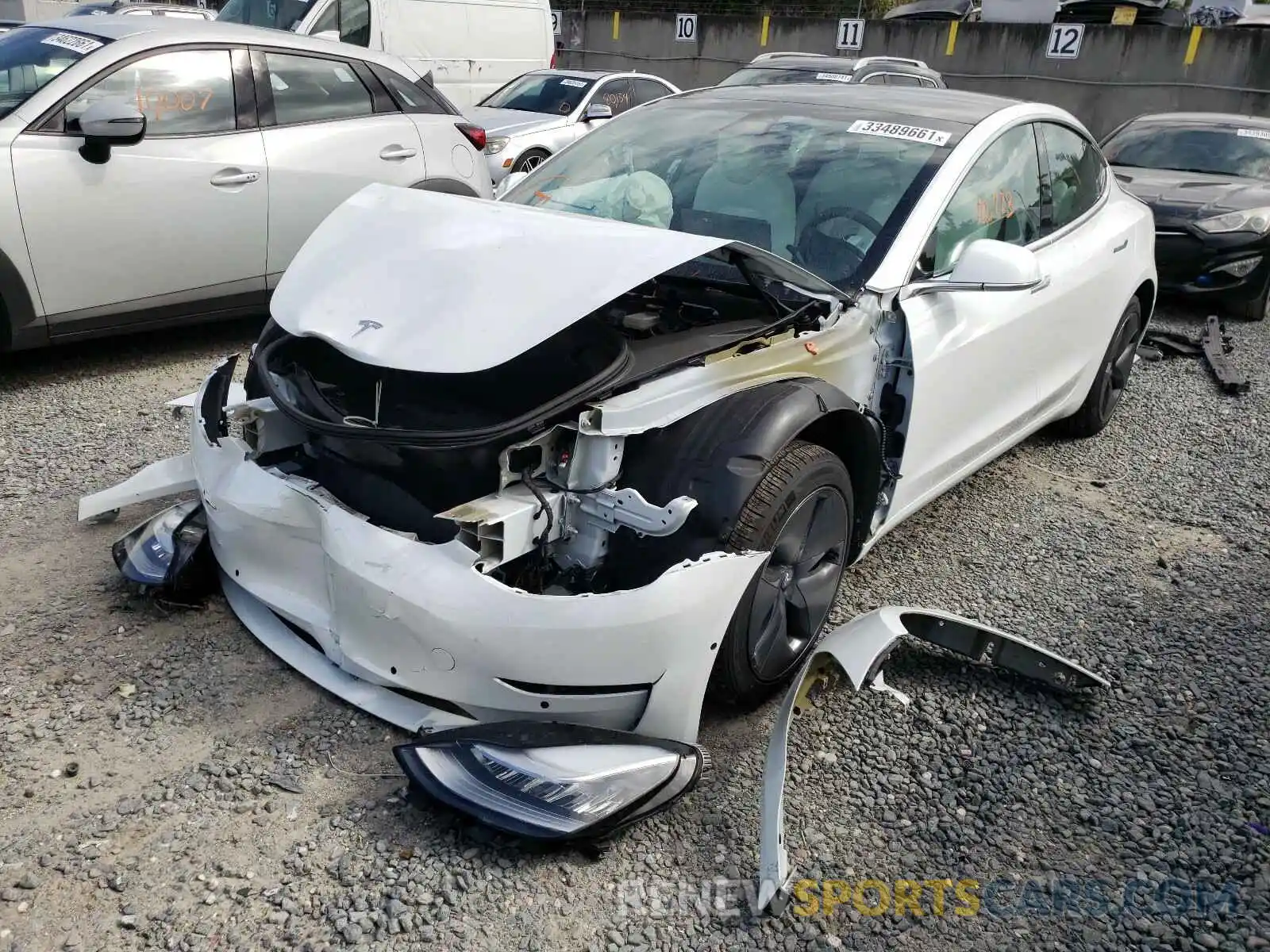 2 Photograph of a damaged car 5YJ3E1EA2LF509633 TESLA MODEL 3 2020