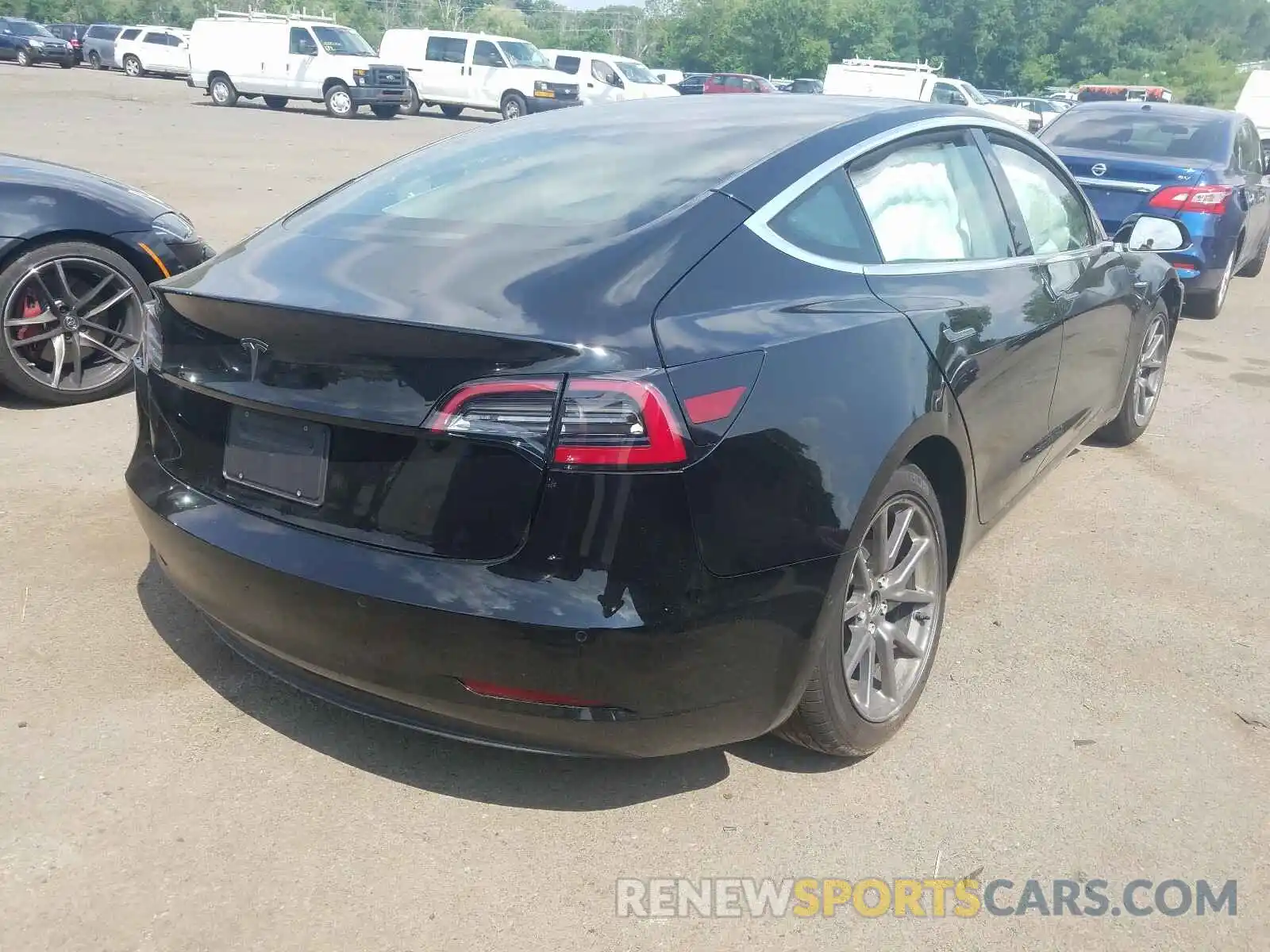 4 Photograph of a damaged car 5YJ3E1EA2LF590245 TESLA MODEL 3 2020