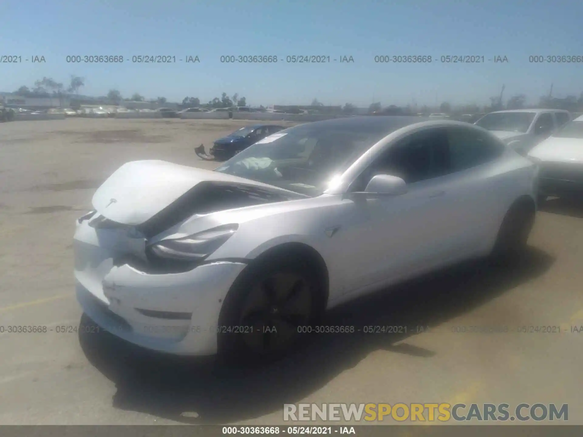 2 Photograph of a damaged car 5YJ3E1EA2LF612678 TESLA MODEL 3 2020