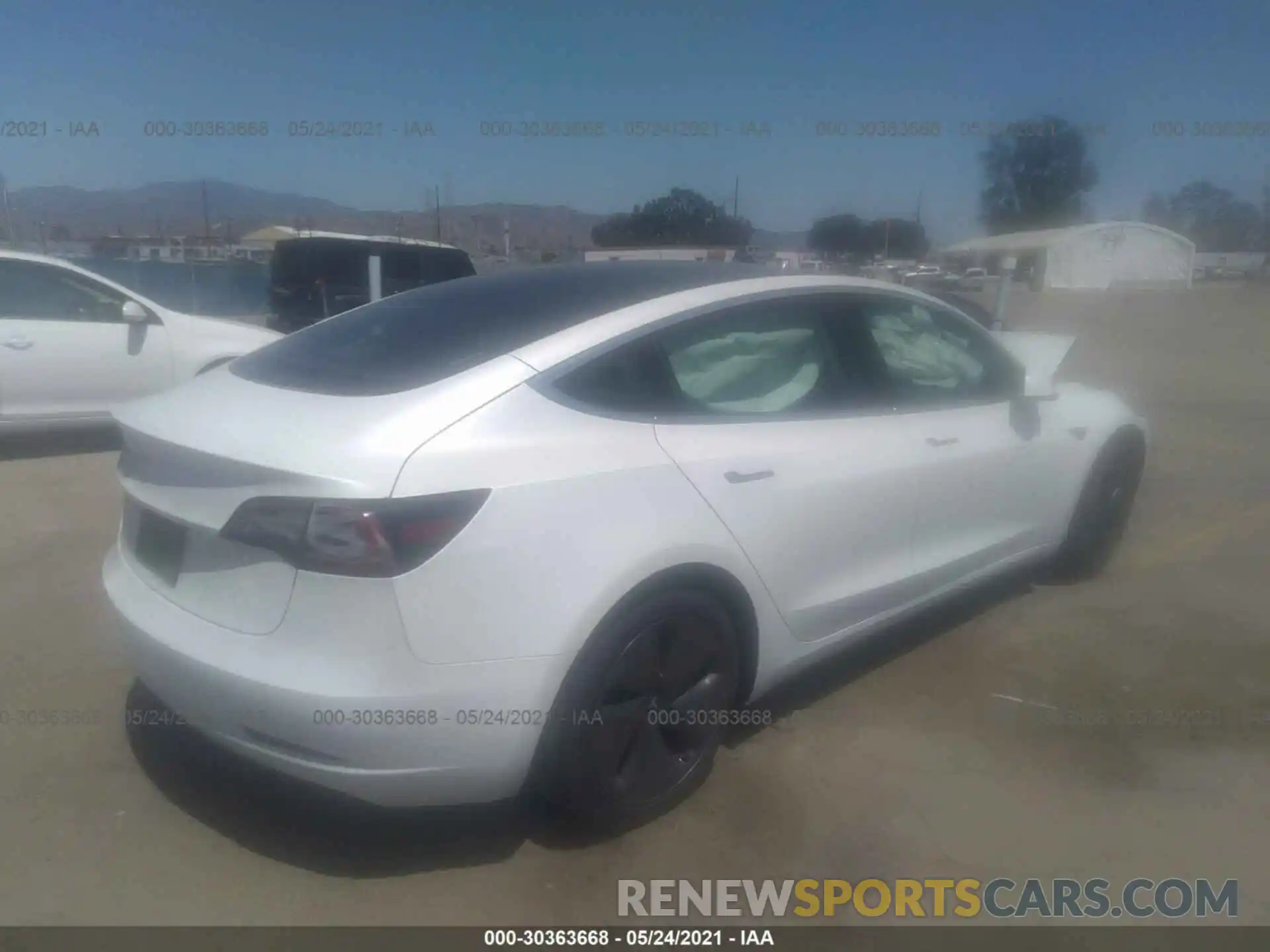 4 Photograph of a damaged car 5YJ3E1EA2LF612678 TESLA MODEL 3 2020