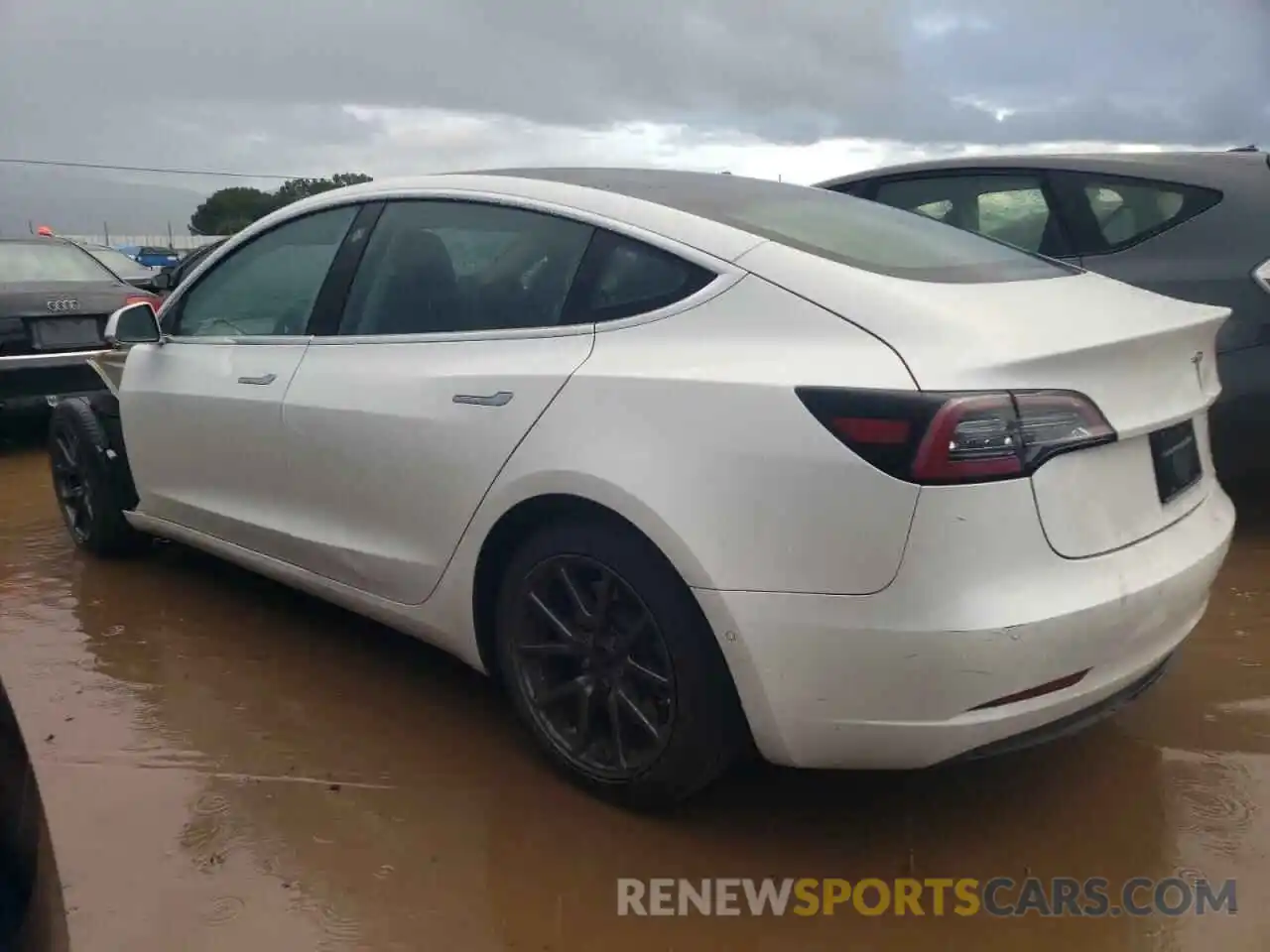 2 Photograph of a damaged car 5YJ3E1EA2LF612695 TESLA MODEL 3 2020