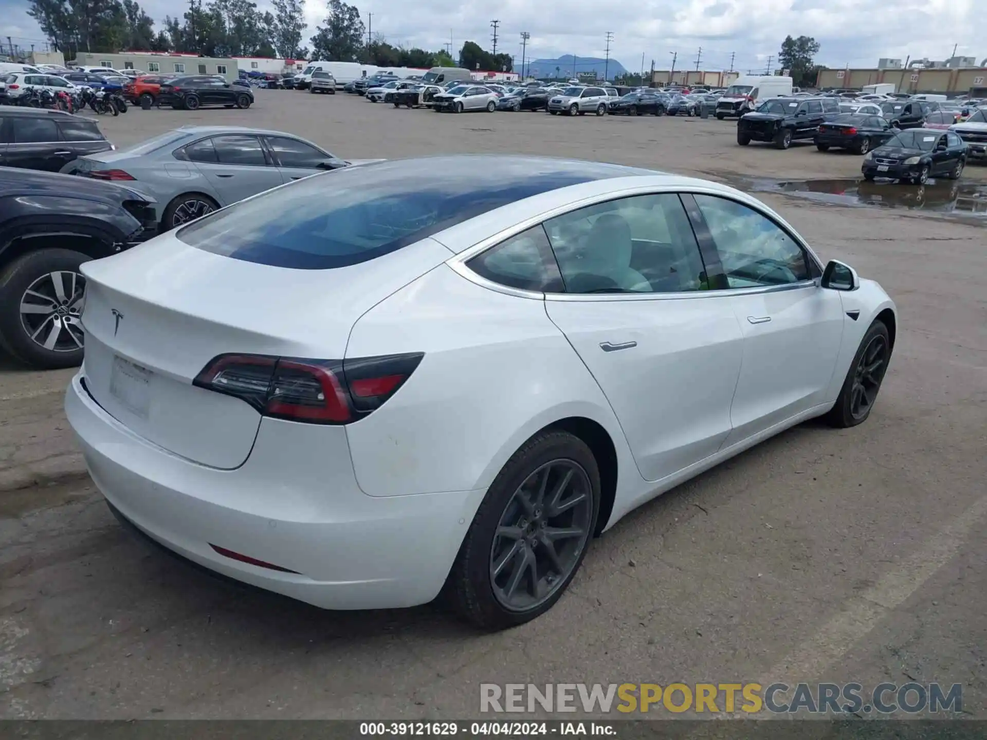 4 Photograph of a damaged car 5YJ3E1EA2LF615676 TESLA MODEL 3 2020