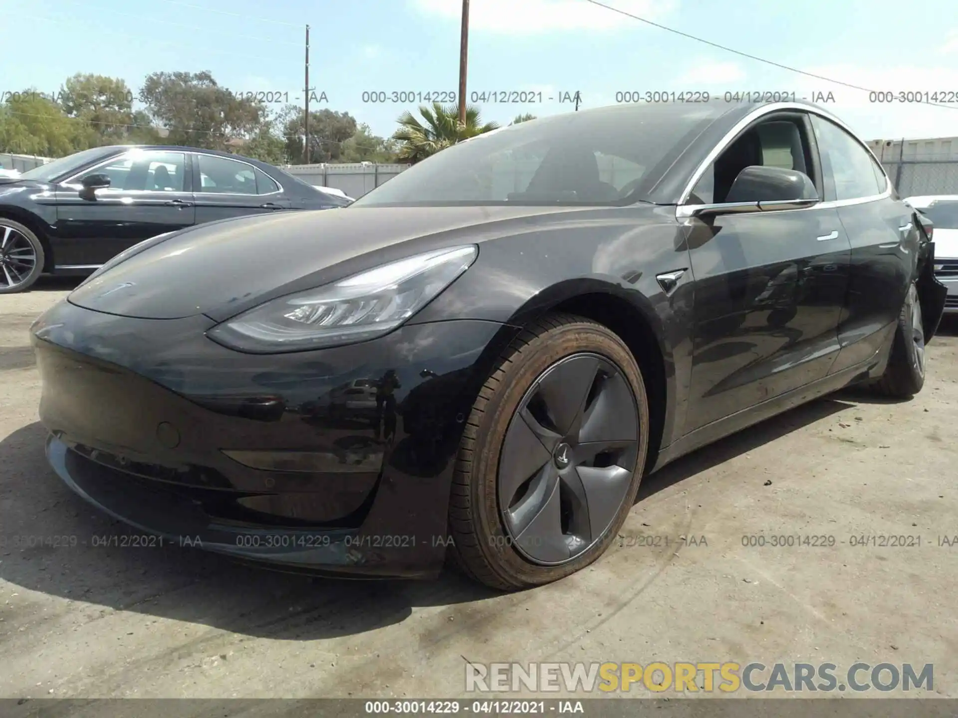 2 Photograph of a damaged car 5YJ3E1EA2LF630095 TESLA MODEL 3 2020