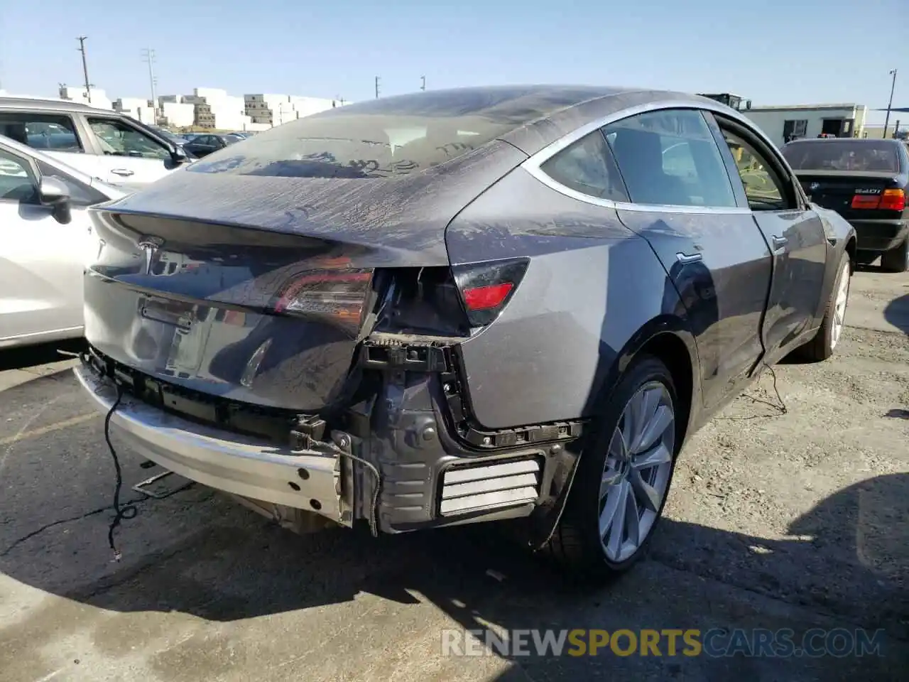 4 Photograph of a damaged car 5YJ3E1EA2LF630632 TESLA MODEL 3 2020