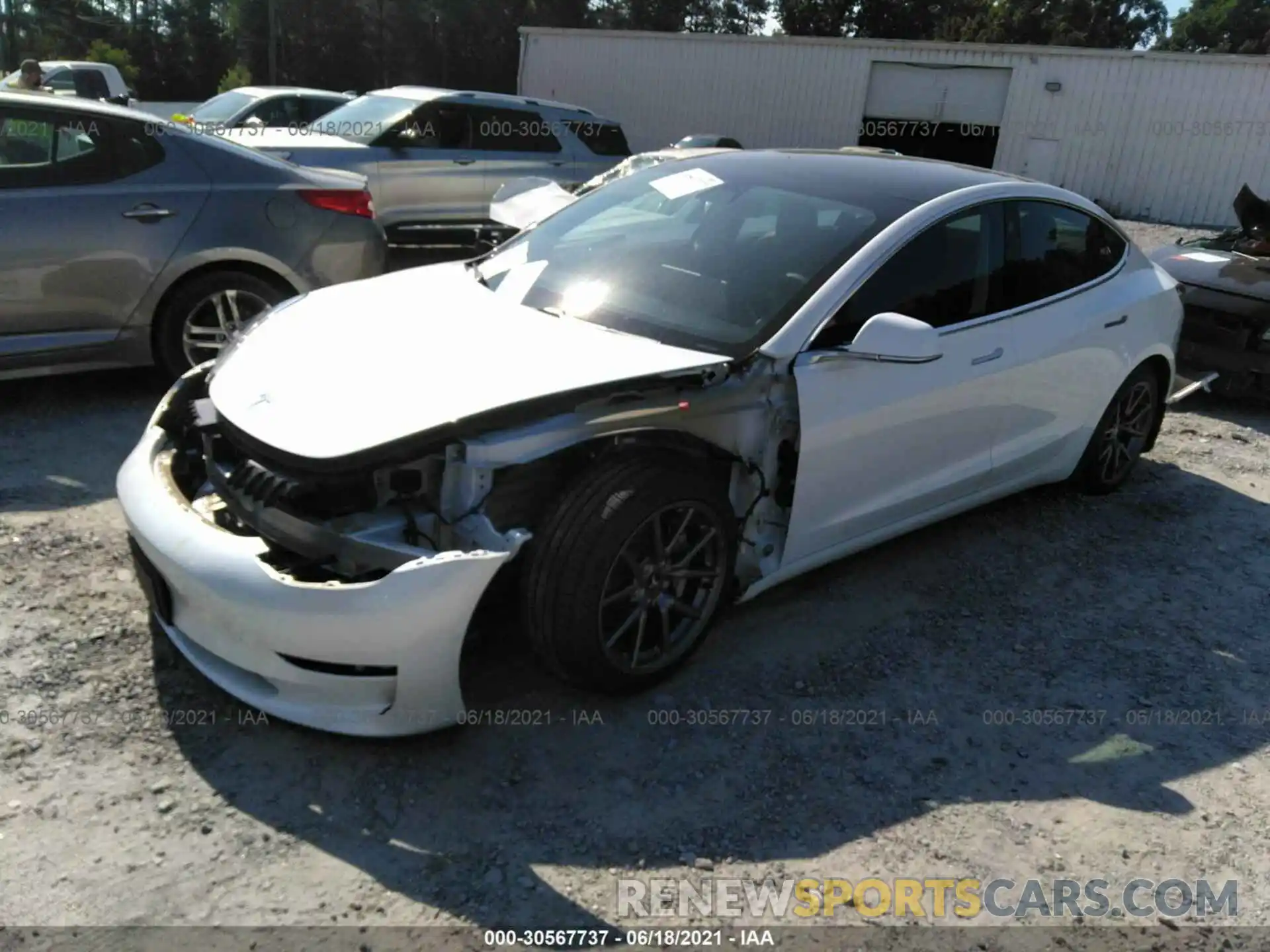 2 Photograph of a damaged car 5YJ3E1EA2LF632946 TESLA MODEL 3 2020