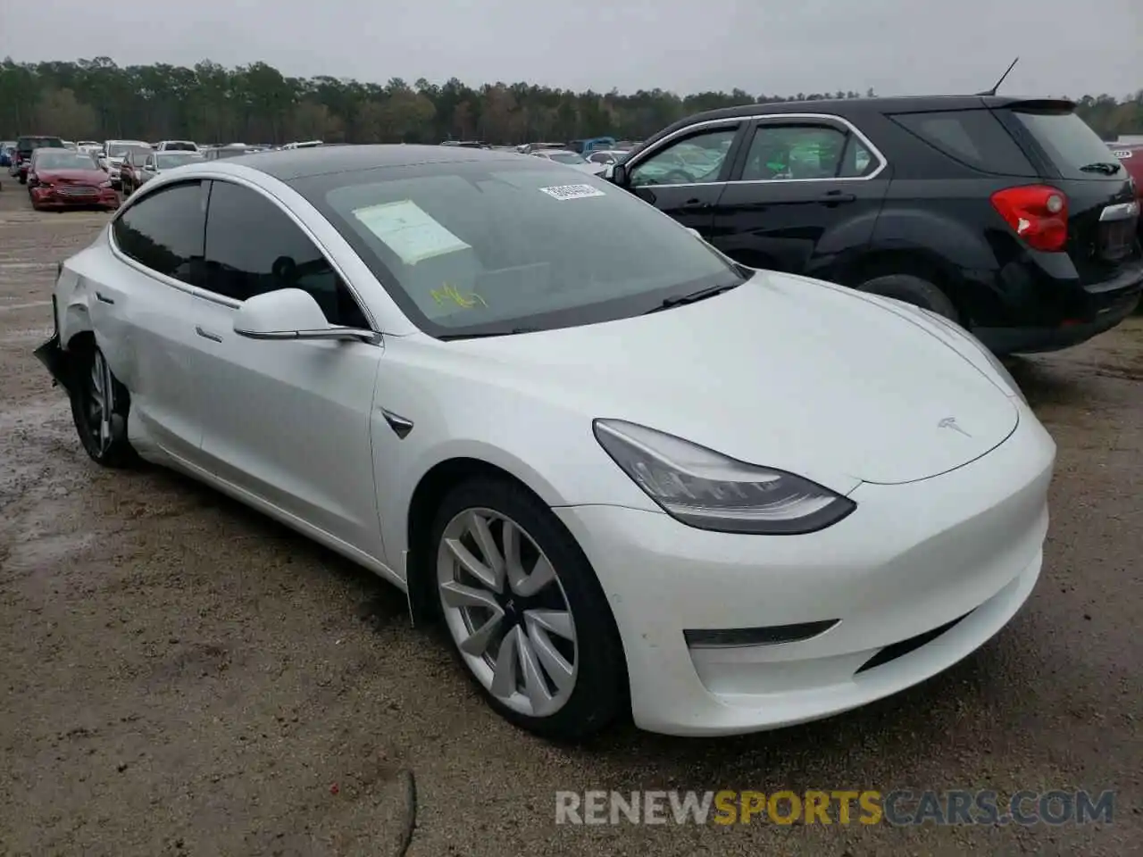 1 Photograph of a damaged car 5YJ3E1EA2LF634938 TESLA MODEL 3 2020