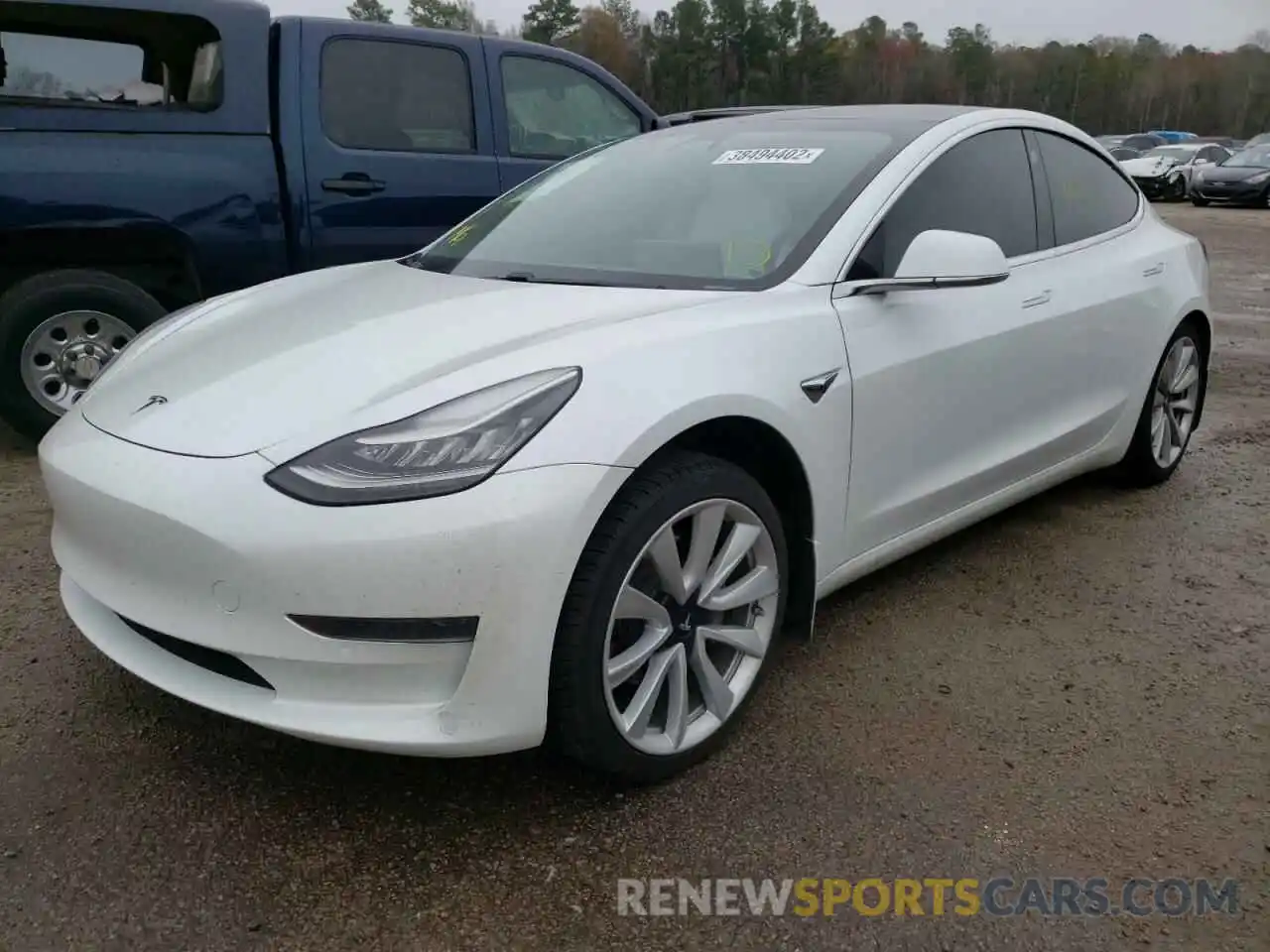 2 Photograph of a damaged car 5YJ3E1EA2LF634938 TESLA MODEL 3 2020