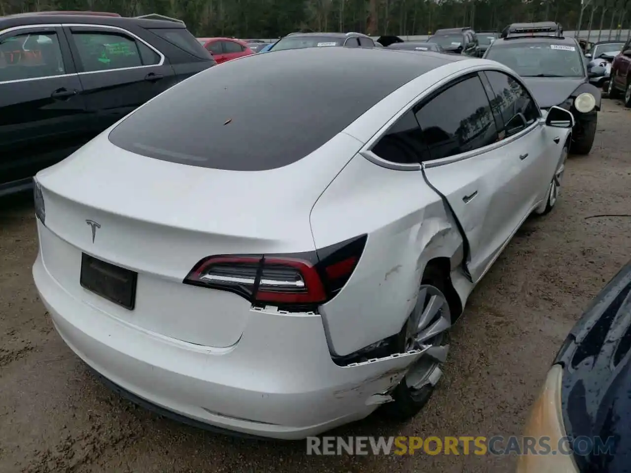 4 Photograph of a damaged car 5YJ3E1EA2LF634938 TESLA MODEL 3 2020