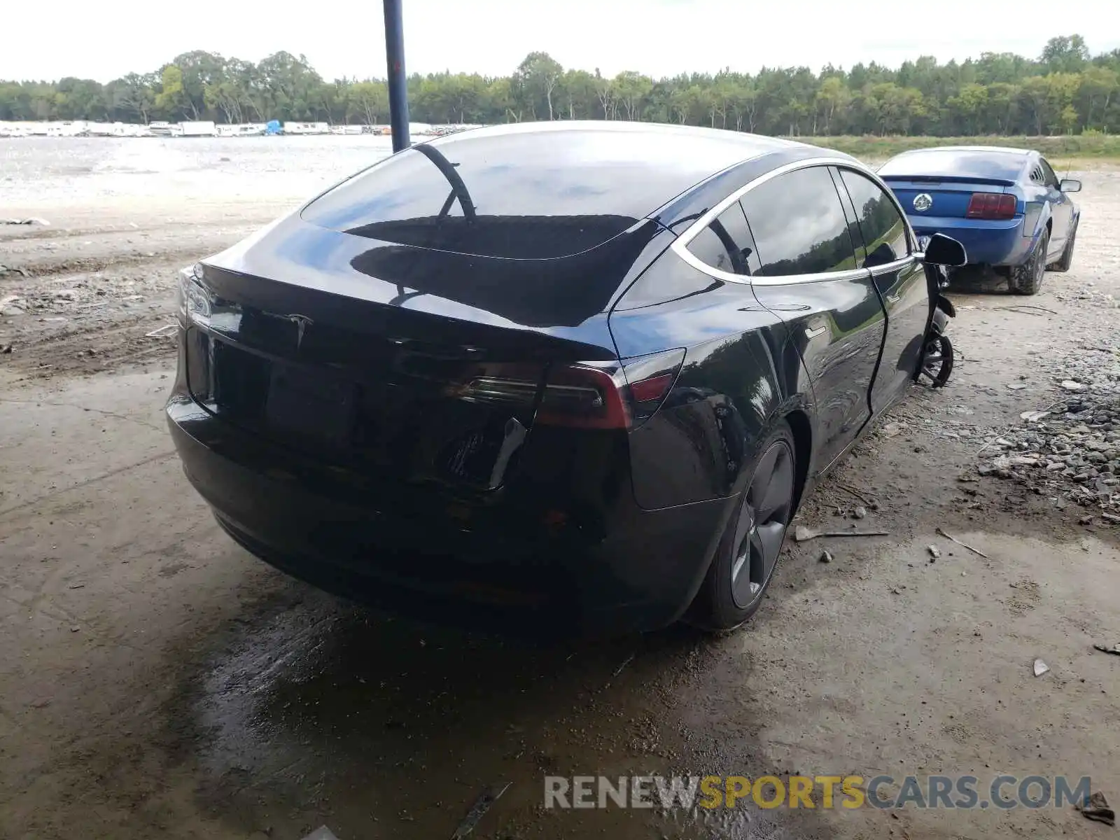 4 Photograph of a damaged car 5YJ3E1EA2LF643879 TESLA MODEL 3 2020