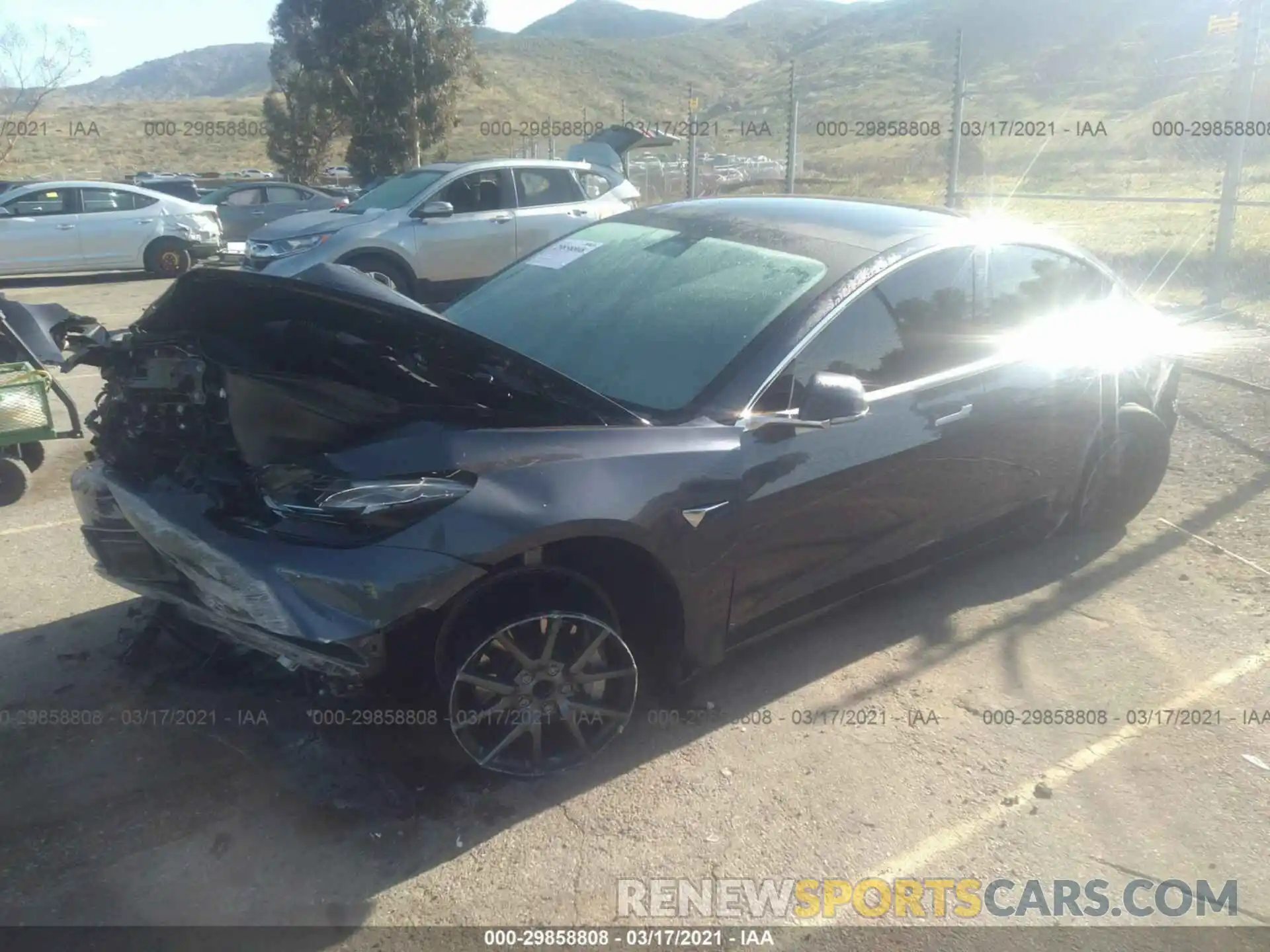 2 Photograph of a damaged car 5YJ3E1EA2LF644076 TESLA MODEL 3 2020