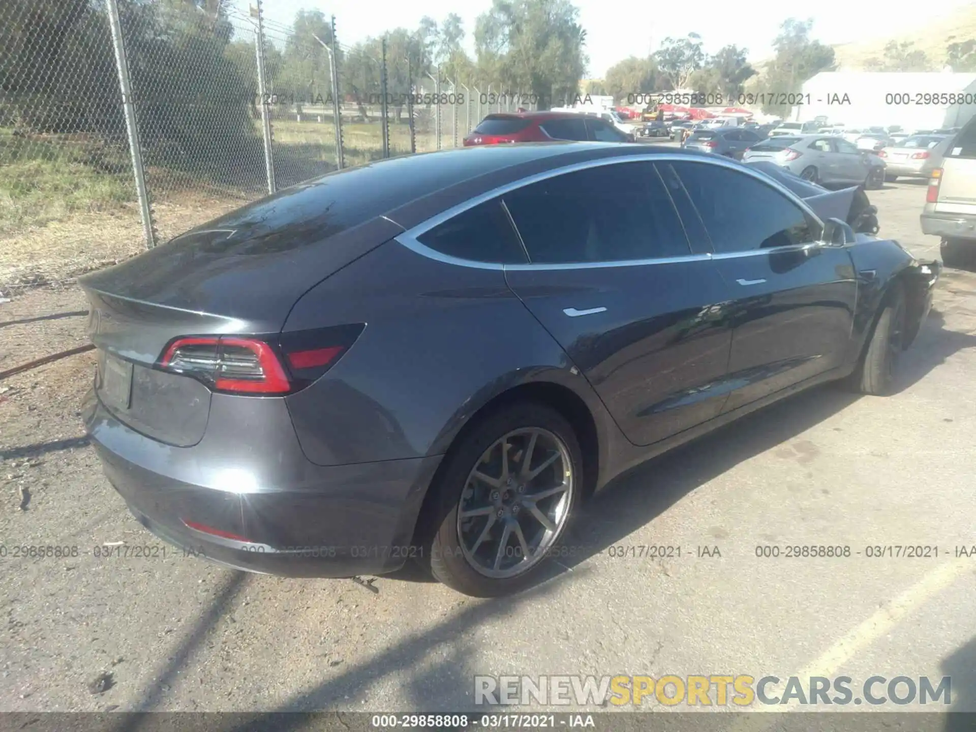 4 Photograph of a damaged car 5YJ3E1EA2LF644076 TESLA MODEL 3 2020