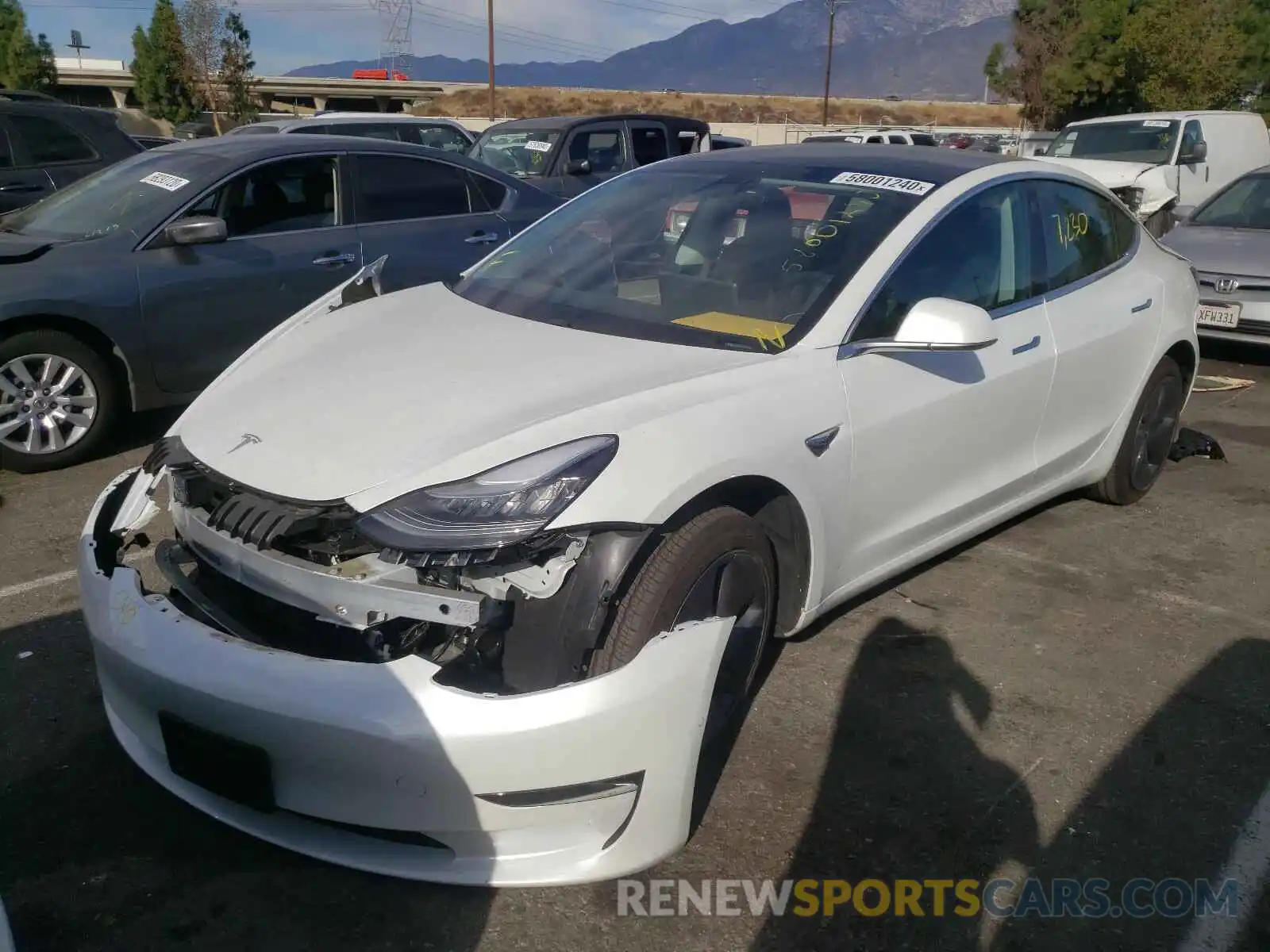 2 Photograph of a damaged car 5YJ3E1EA2LF644885 TESLA MODEL 3 2020