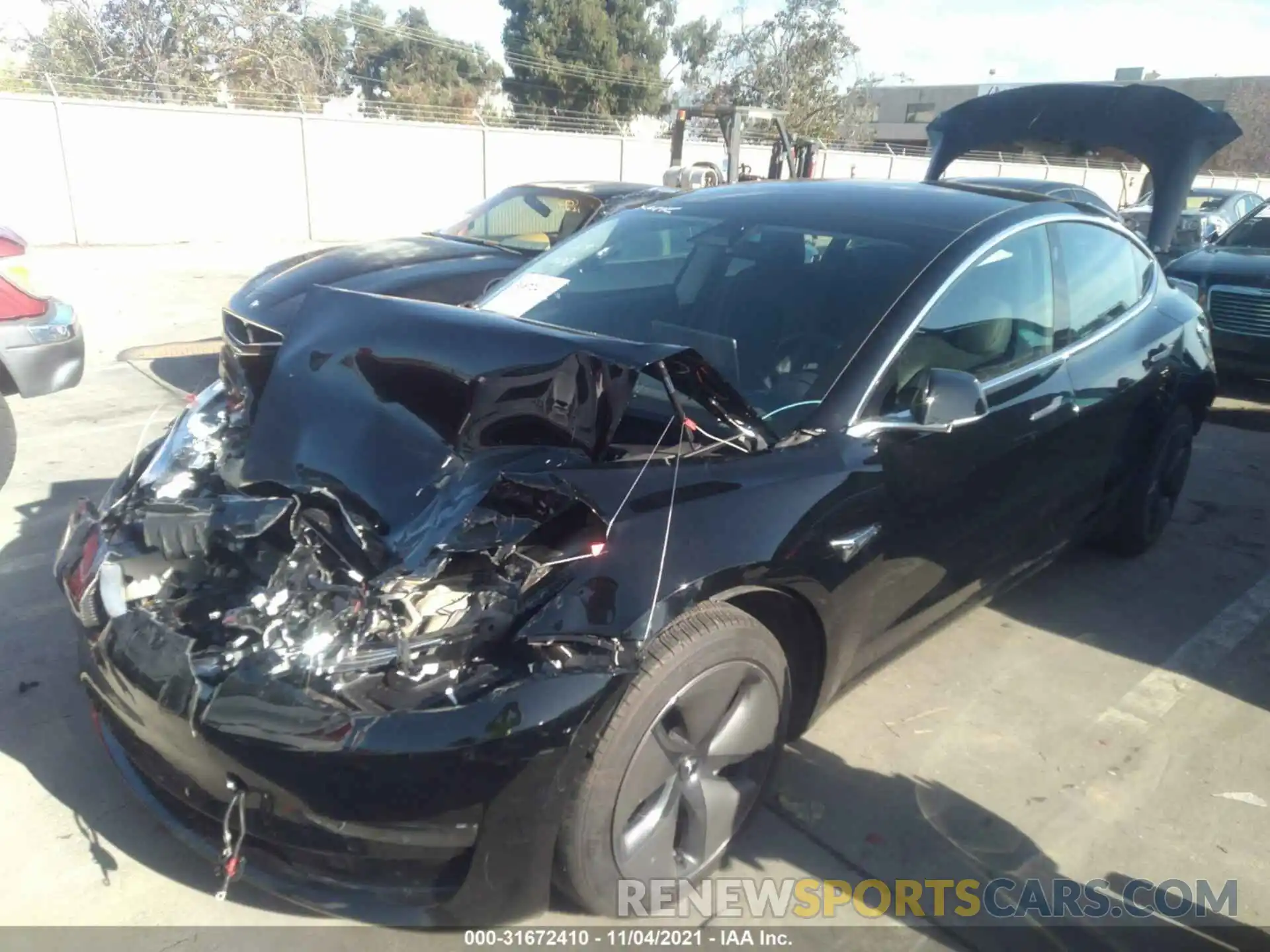 2 Photograph of a damaged car 5YJ3E1EA2LF657491 TESLA MODEL 3 2020