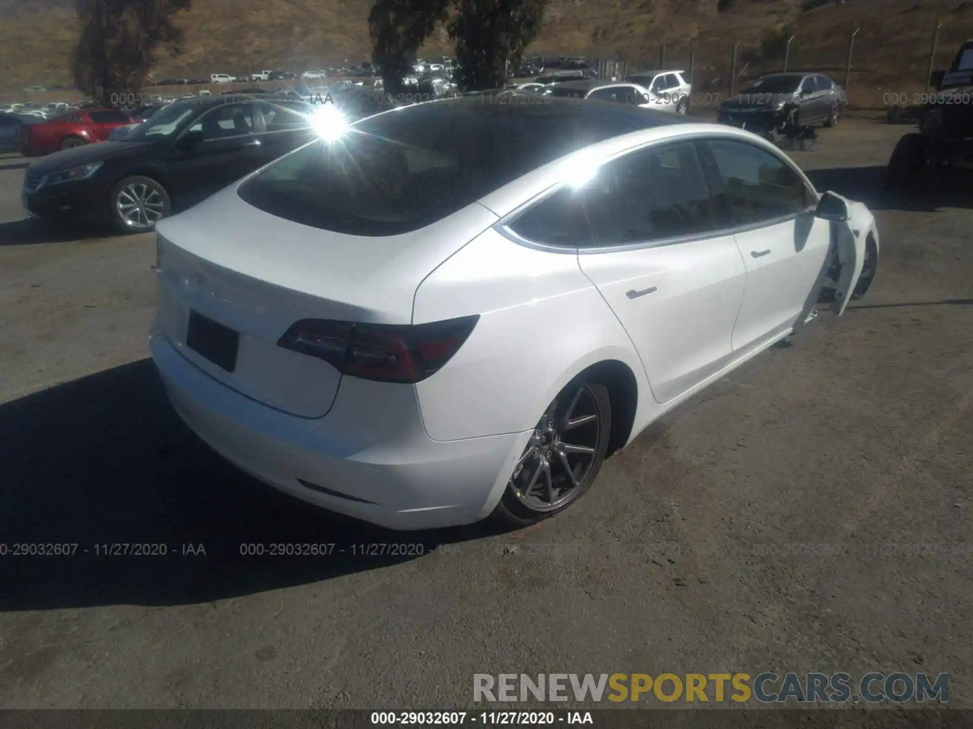 4 Photograph of a damaged car 5YJ3E1EA2LF660388 TESLA MODEL 3 2020