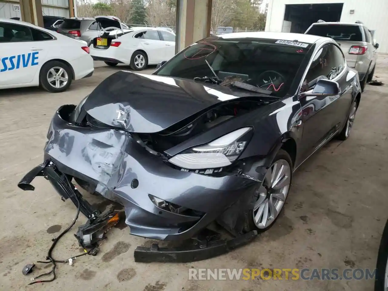 2 Photograph of a damaged car 5YJ3E1EA2LF660925 TESLA MODEL 3 2020