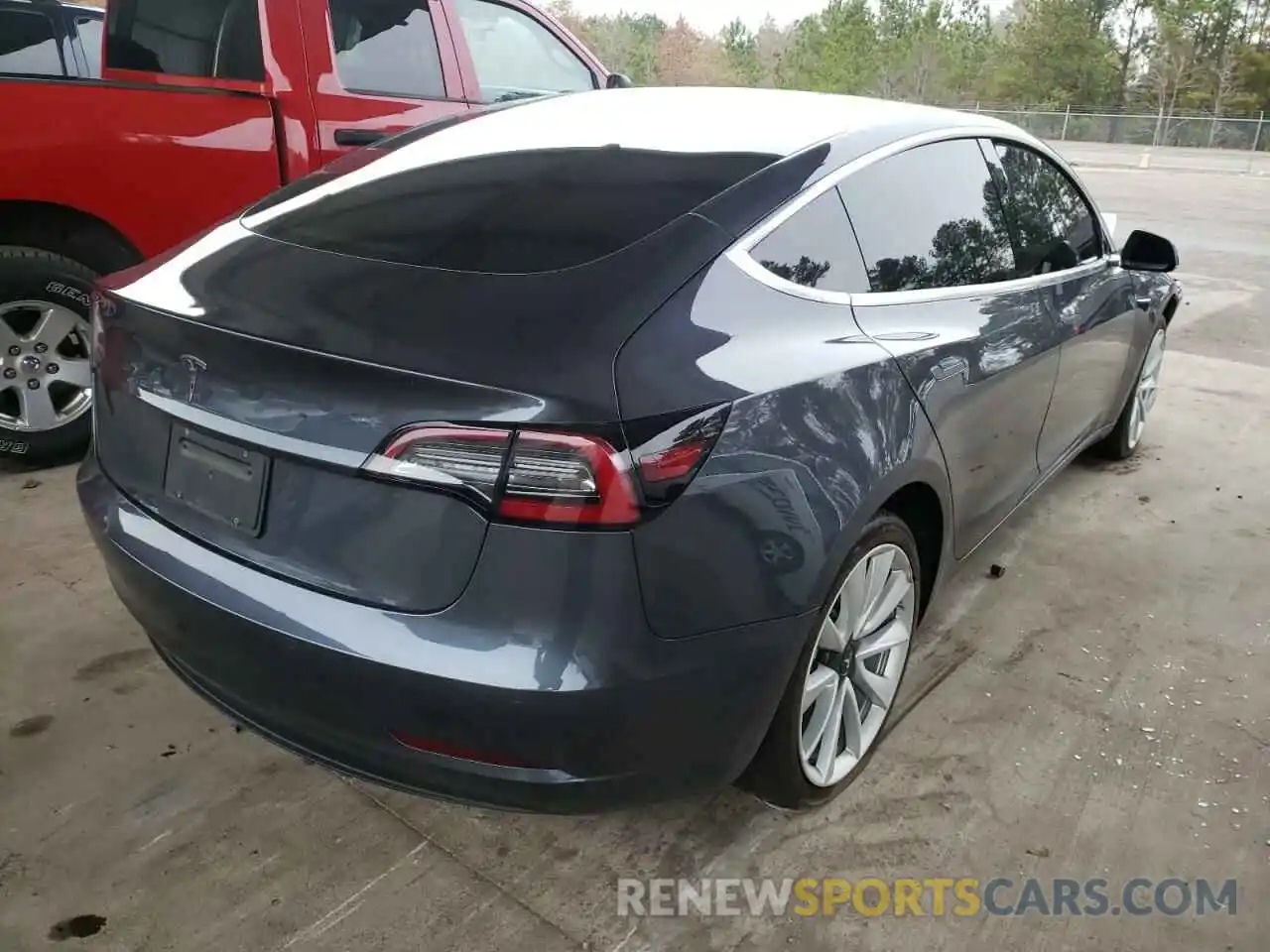 4 Photograph of a damaged car 5YJ3E1EA2LF660925 TESLA MODEL 3 2020