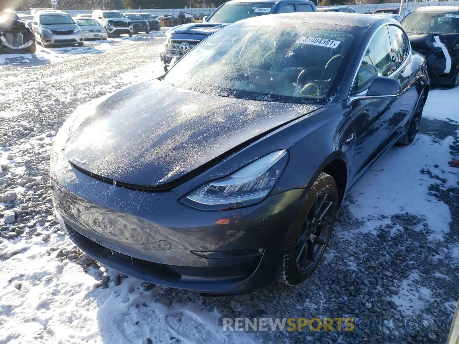 2 Photograph of a damaged car 5YJ3E1EA2LF703837 TESLA MODEL 3 2020