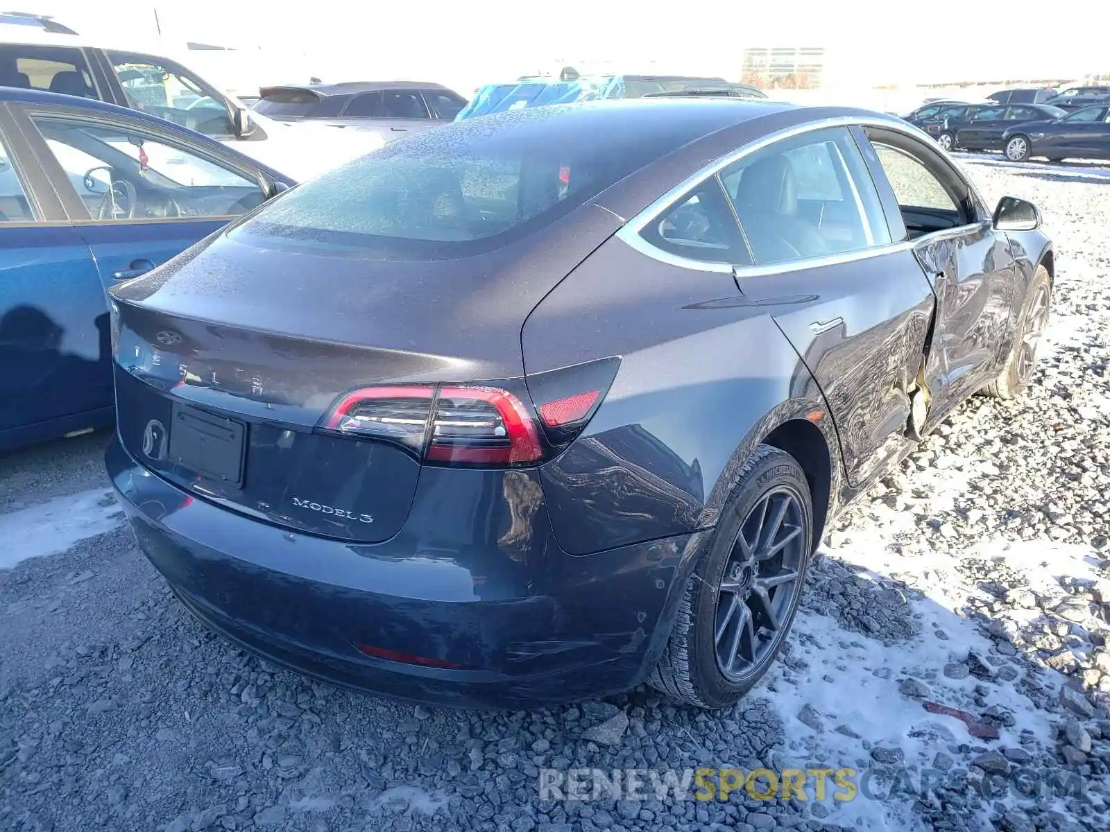 4 Photograph of a damaged car 5YJ3E1EA2LF703837 TESLA MODEL 3 2020