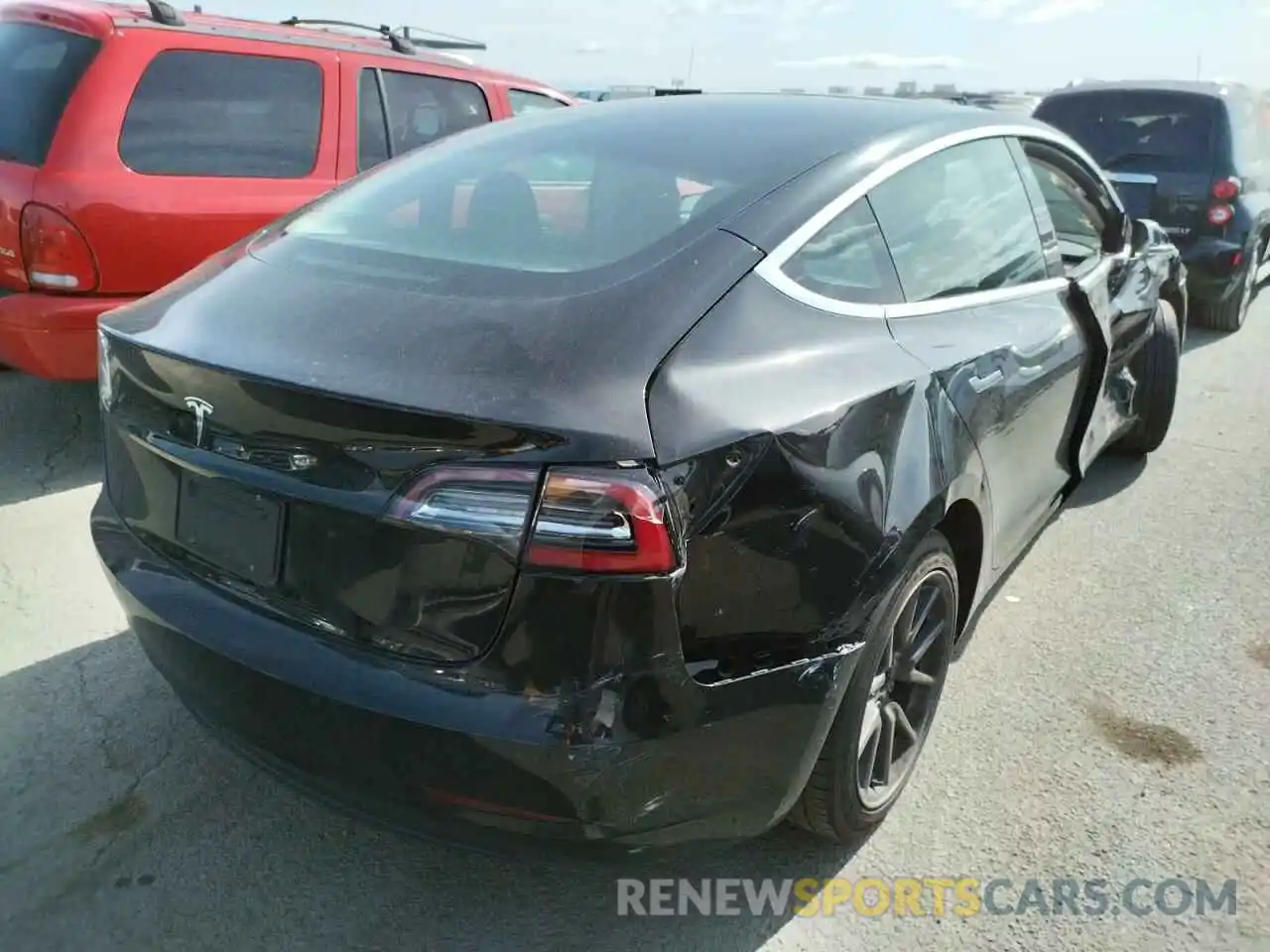 4 Photograph of a damaged car 5YJ3E1EA2LF704583 TESLA MODEL 3 2020