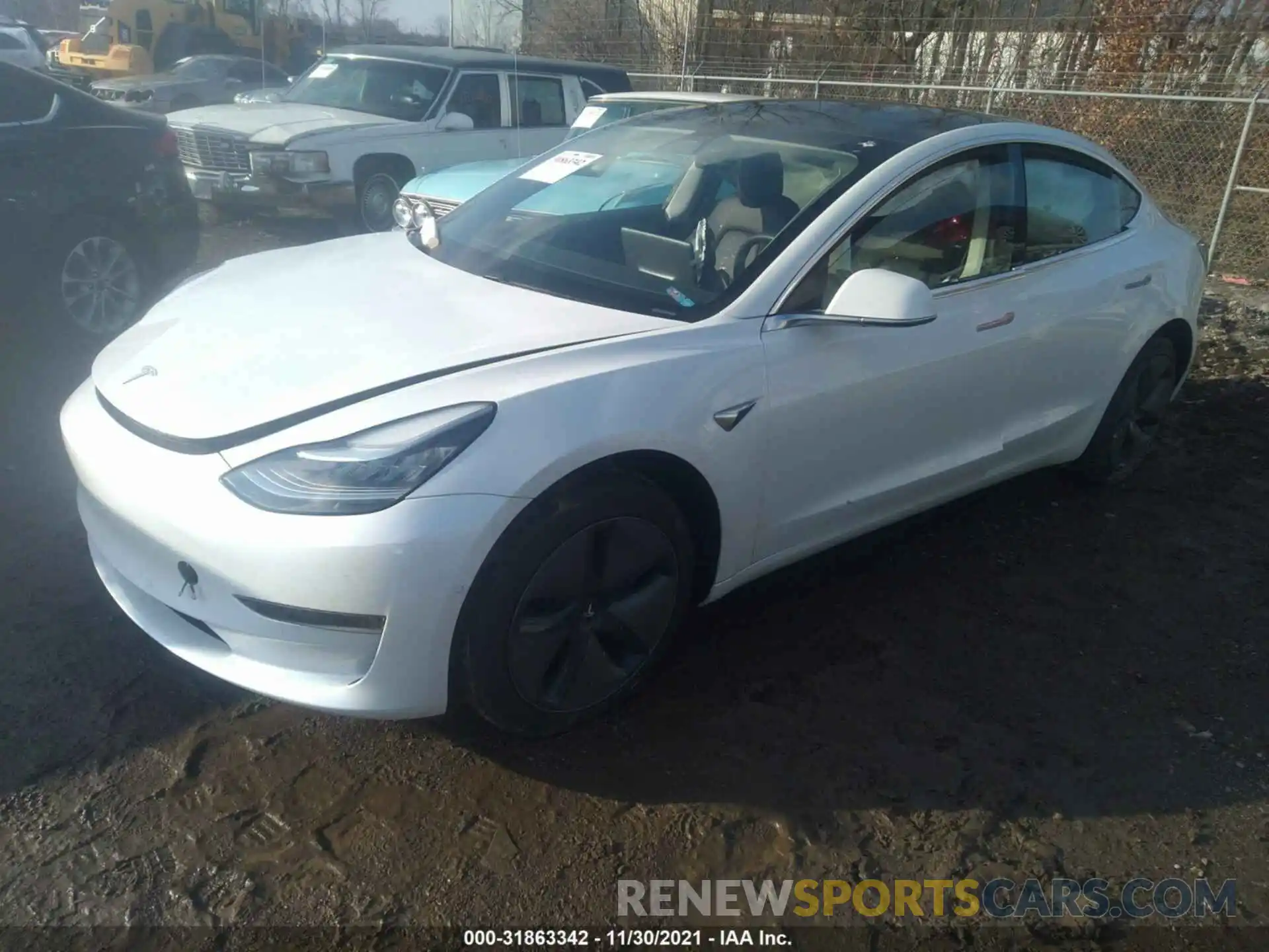 2 Photograph of a damaged car 5YJ3E1EA2LF706303 TESLA MODEL 3 2020